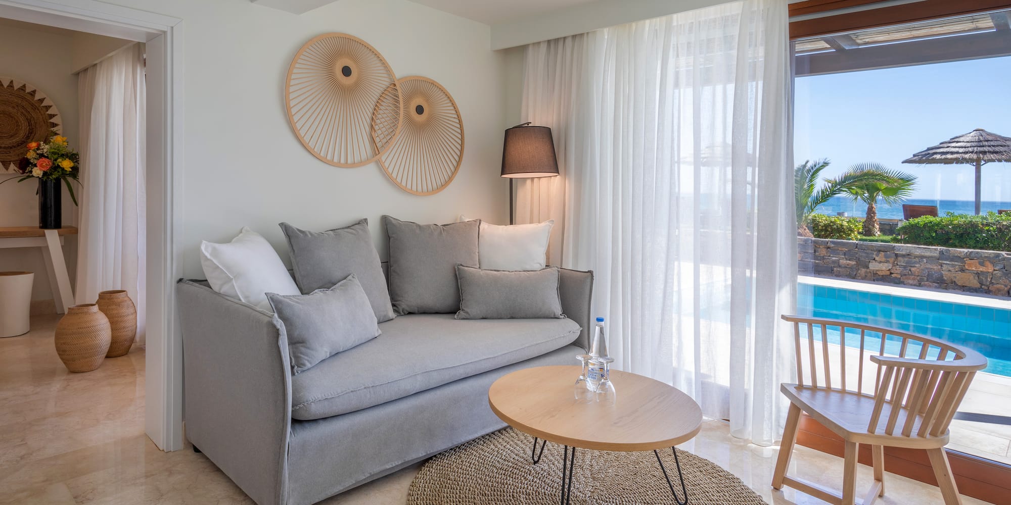 a living room with a couch and a table