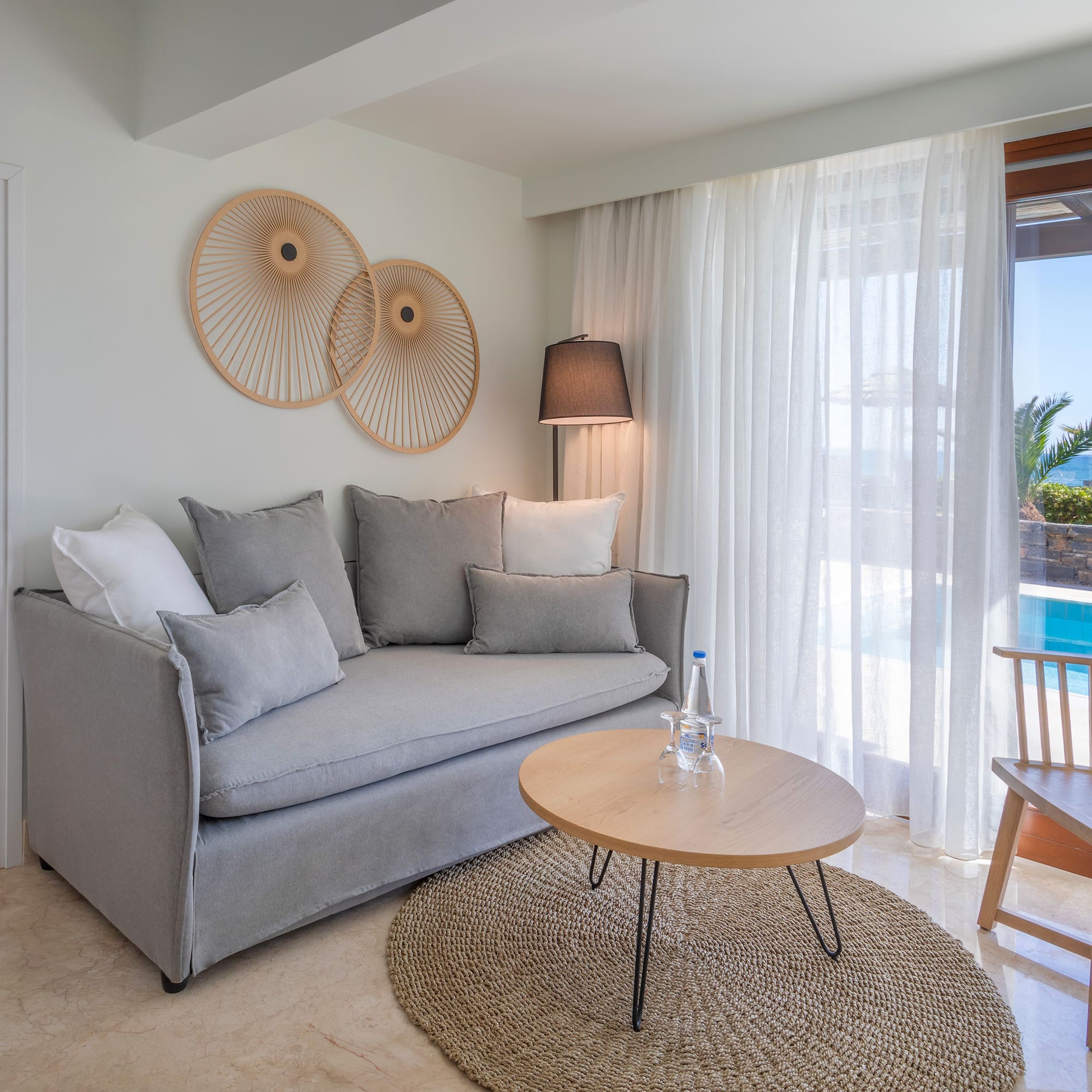 a living room with a couch and a table