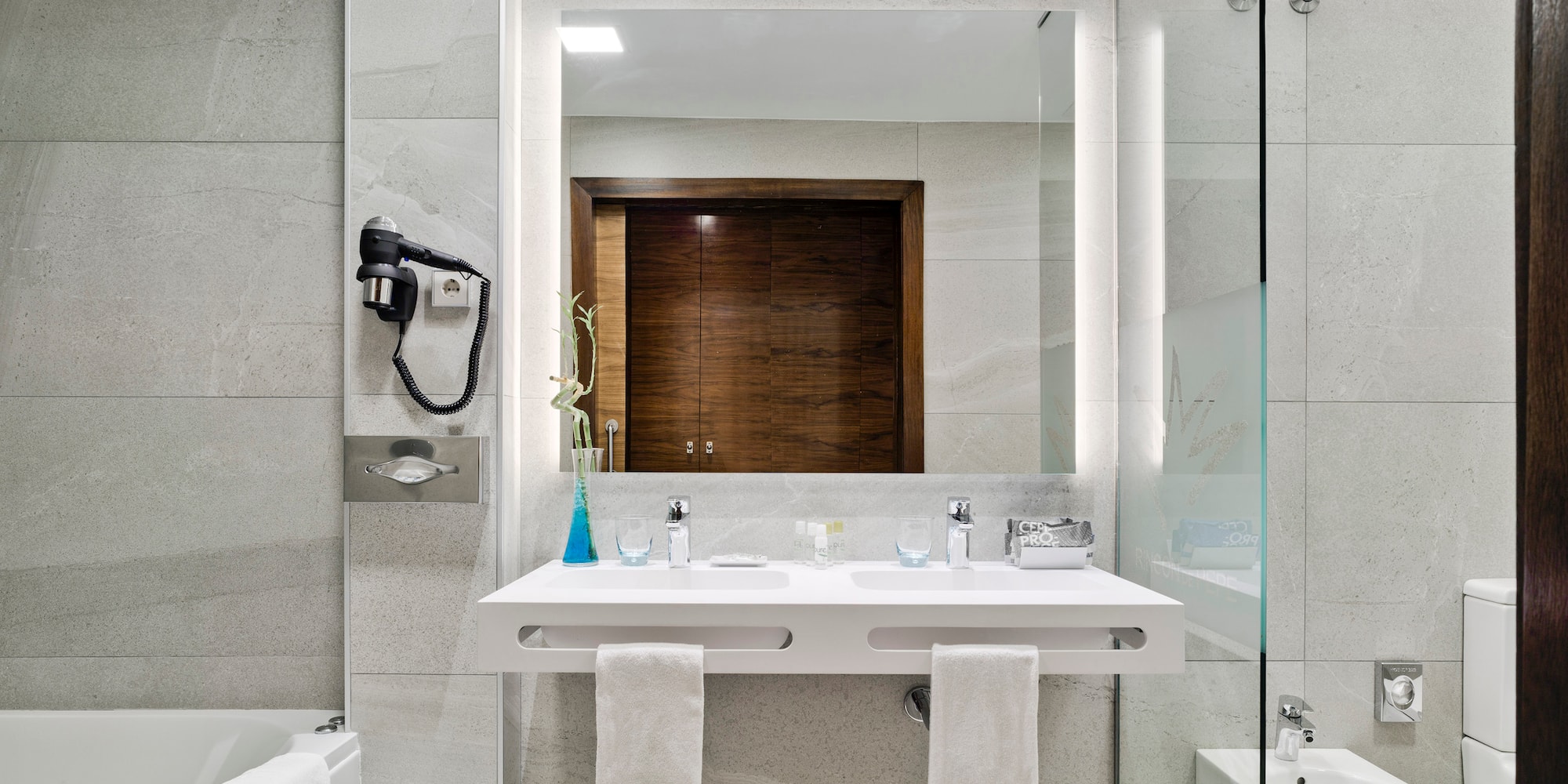 a bathroom with a sink and toilet