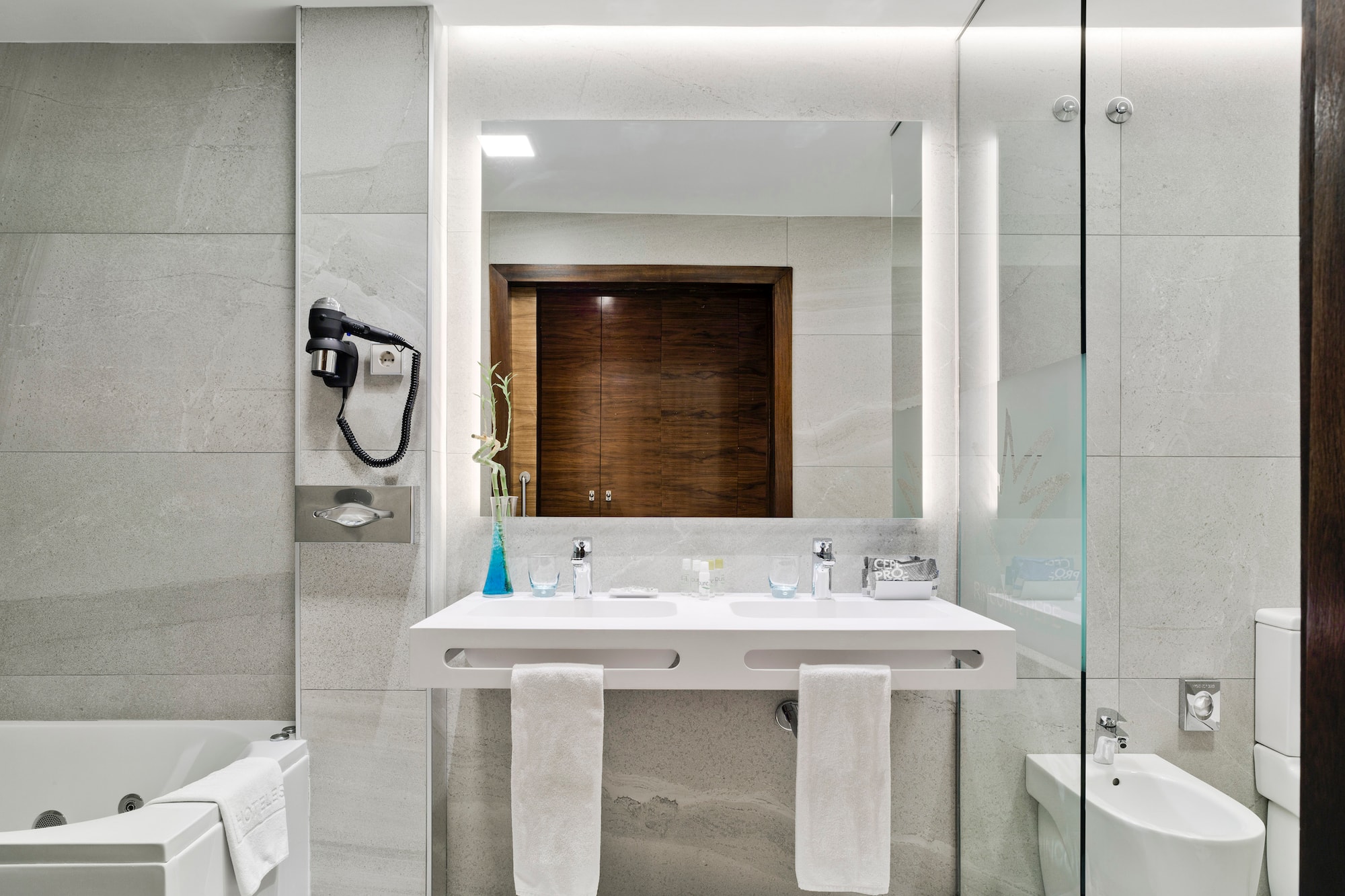 a bathroom with a sink and toilet