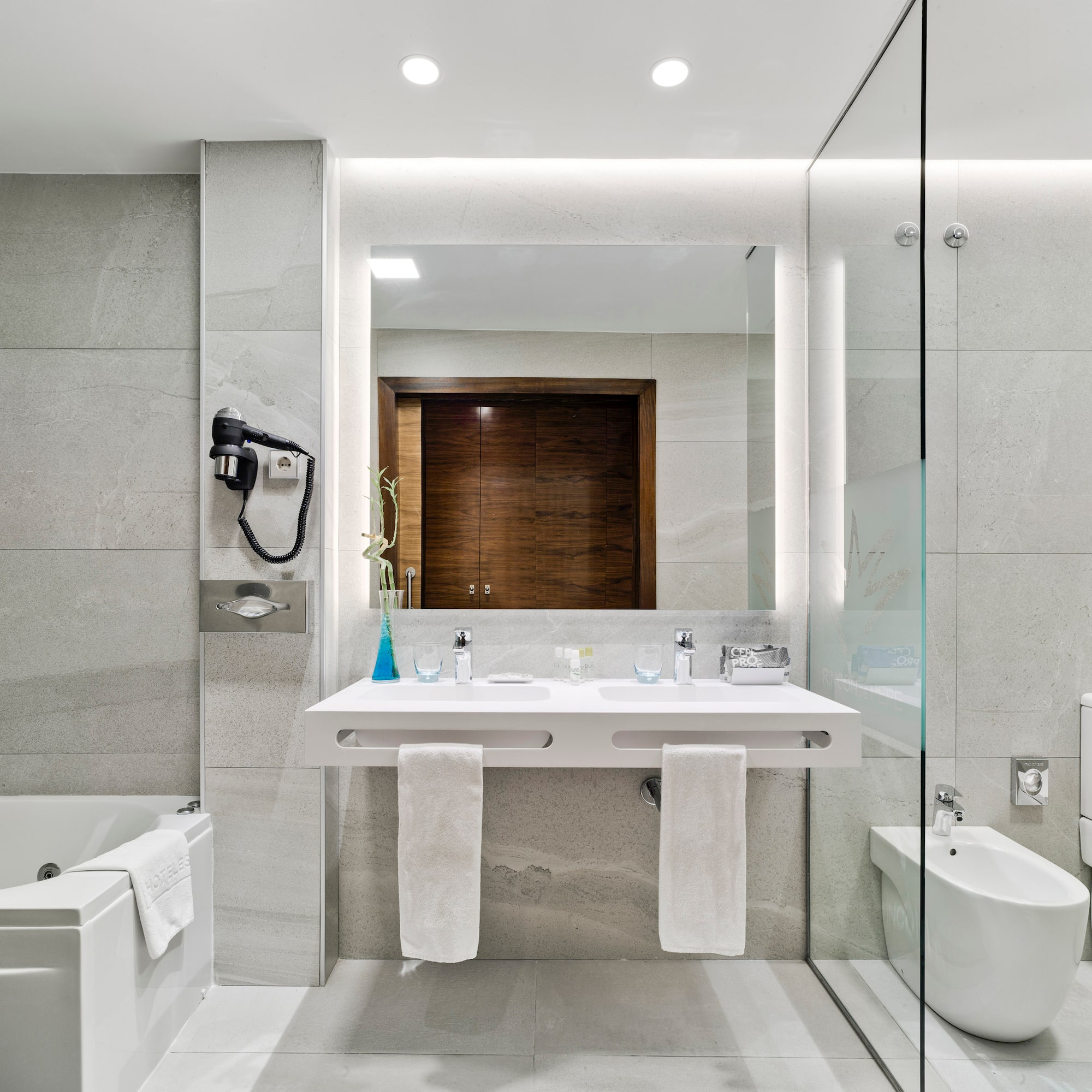 a bathroom with a sink and toilet