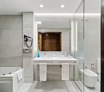 a bathroom with a sink and toilet