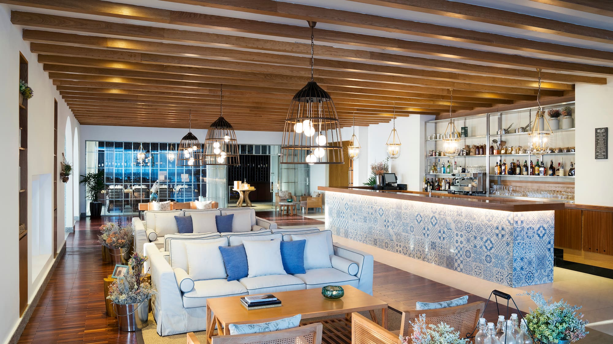 a room with a bar and a couch