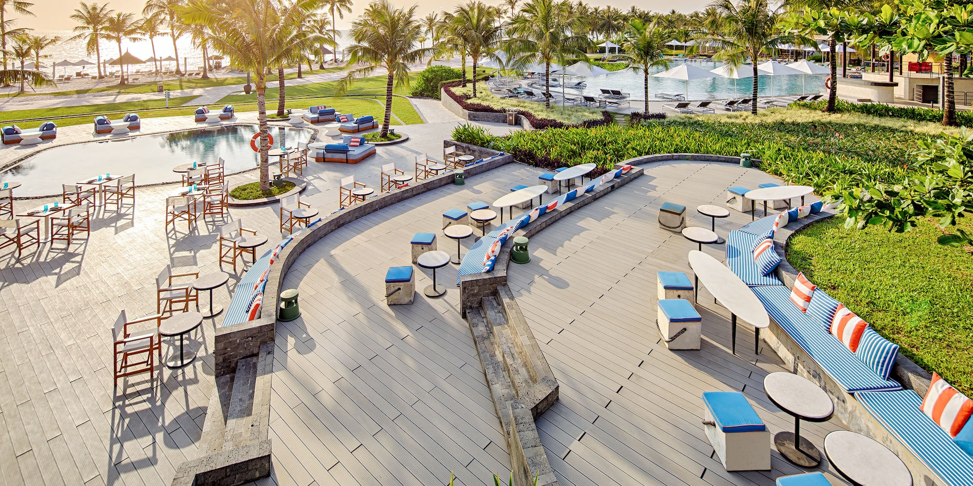 a pool with tables and chairs