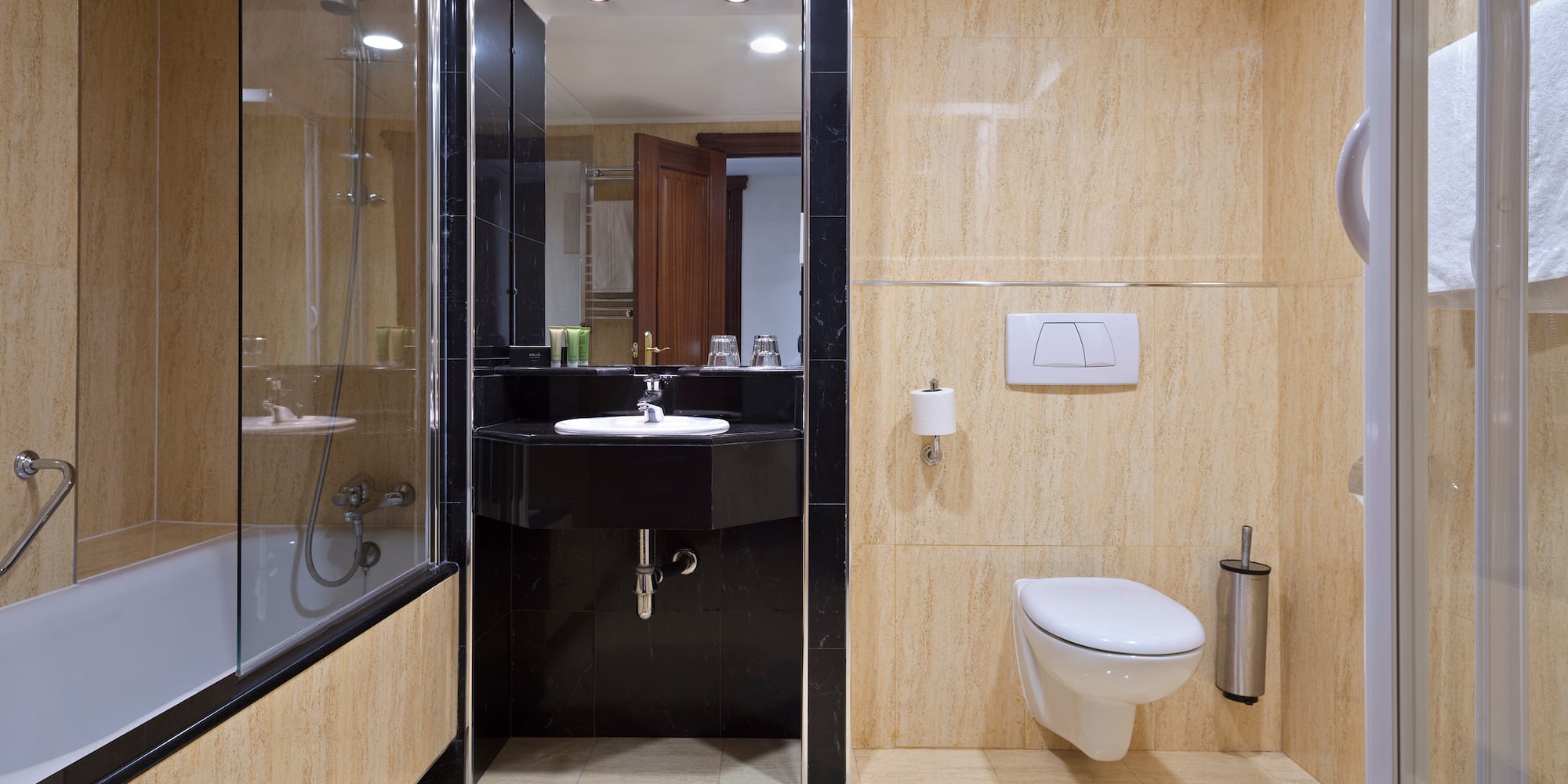 a bathroom with a sink and shower