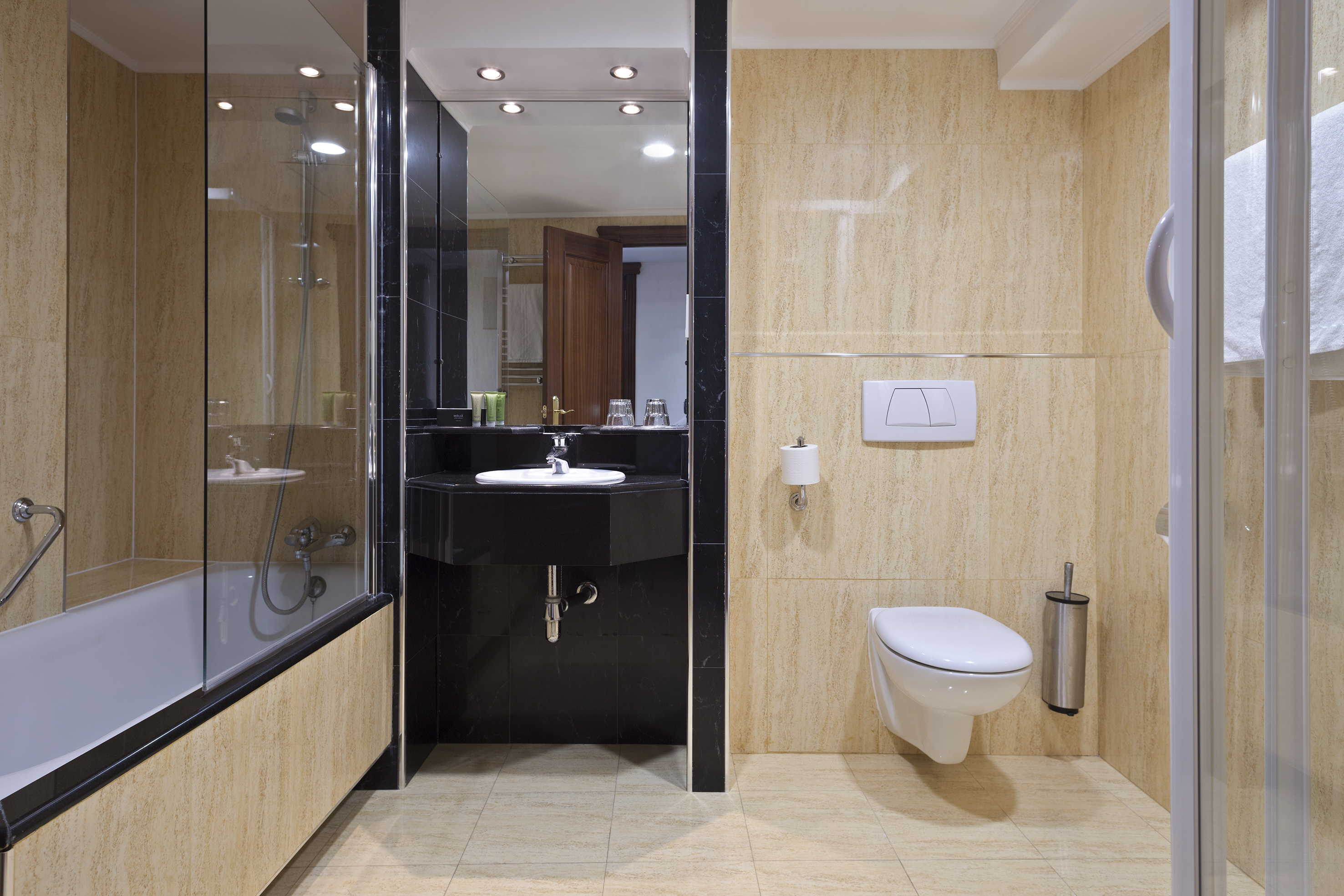 a bathroom with a sink and shower