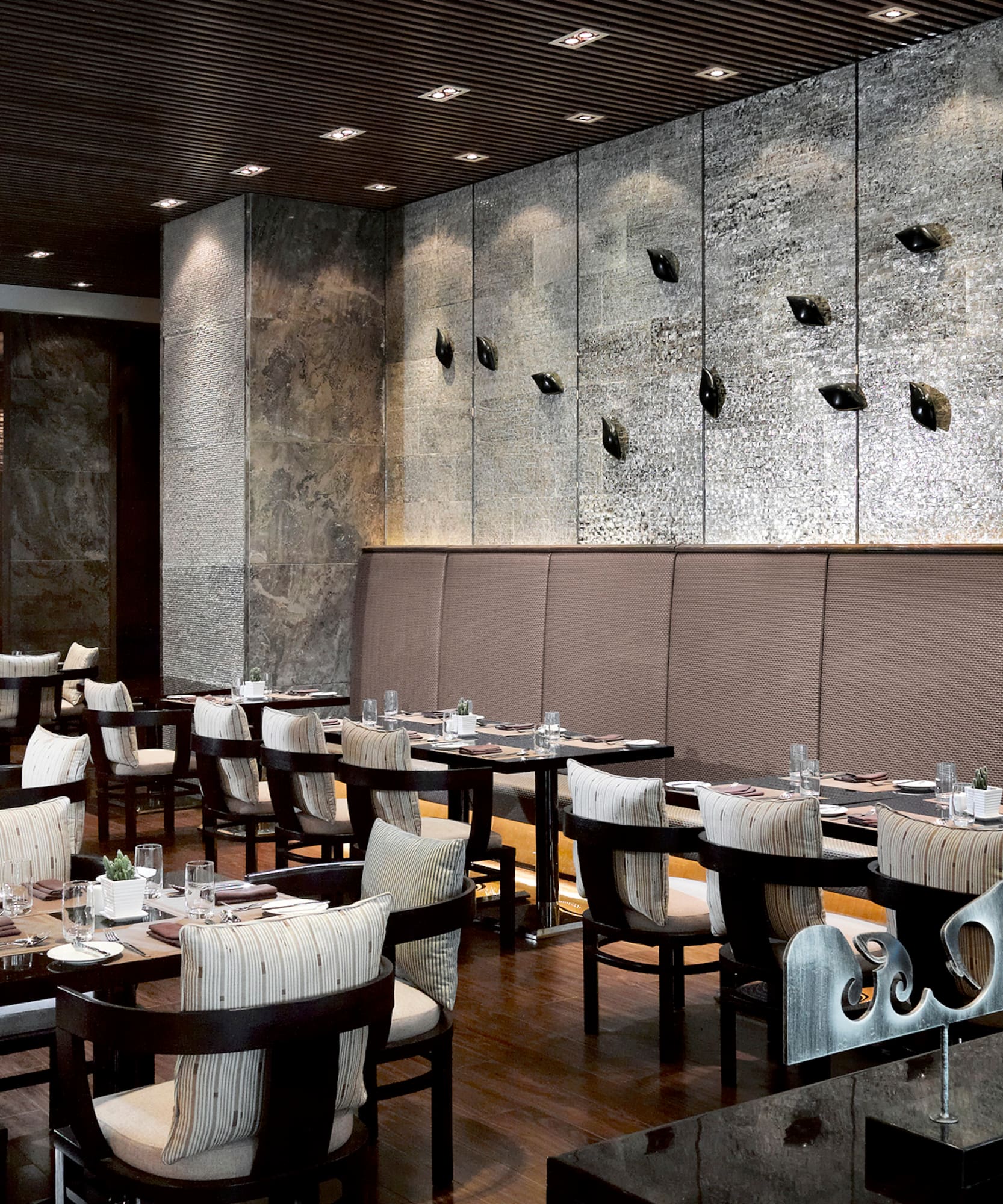 a restaurant with tables and chairs