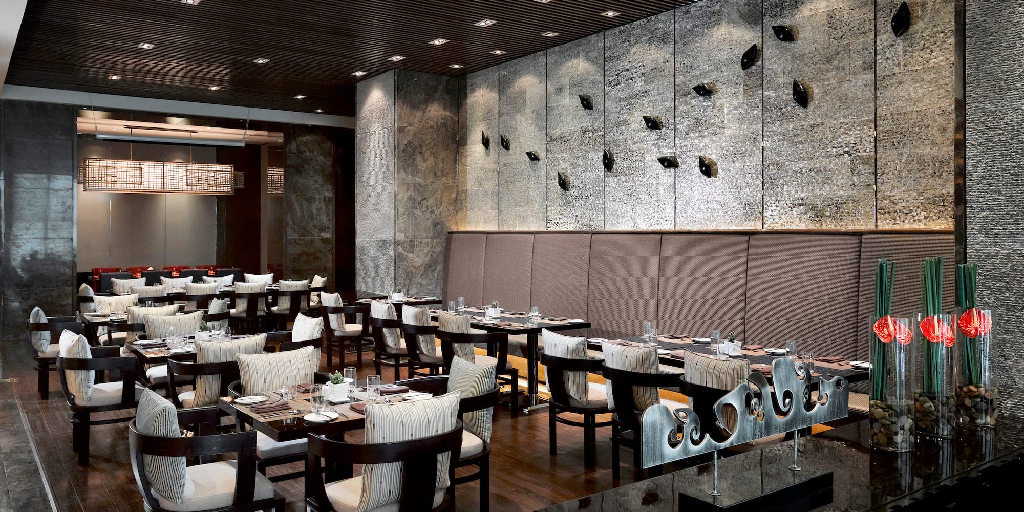 a restaurant with tables and chairs