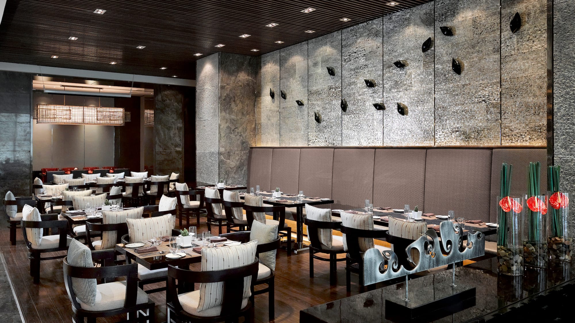 a restaurant with tables and chairs