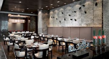 a restaurant with tables and chairs