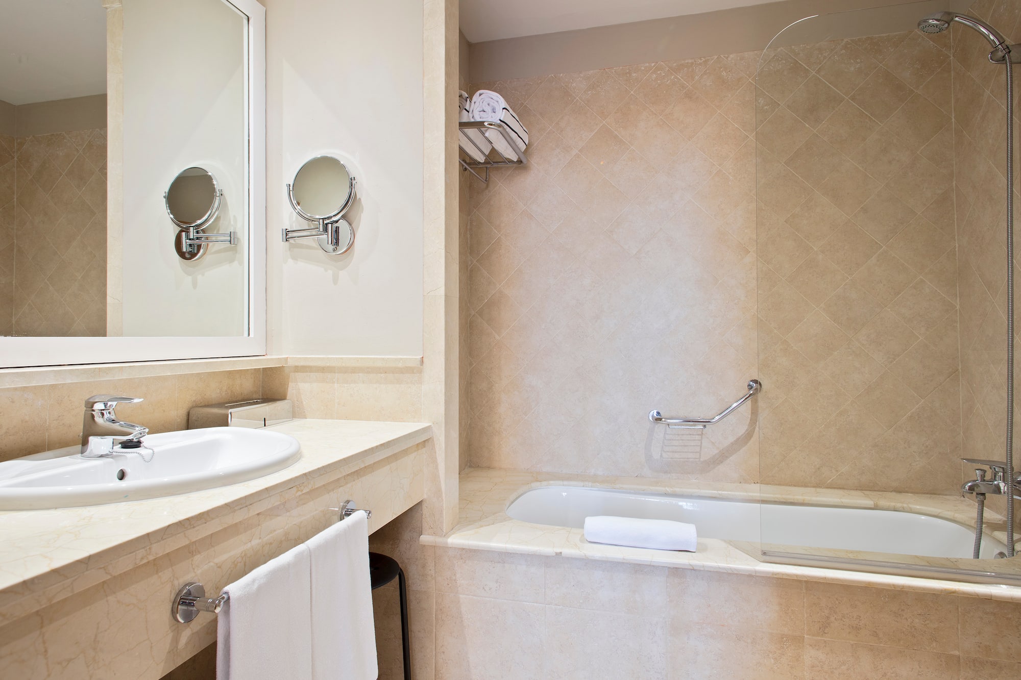 a bathroom with a bathtub and a mirror
