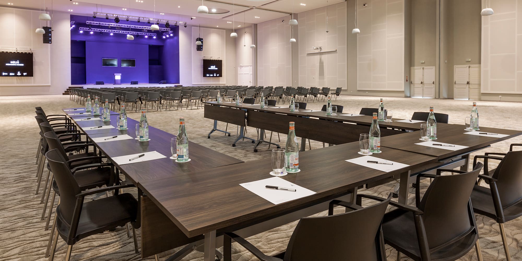 a room with tables and chairs