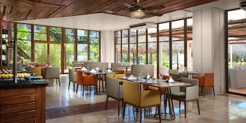 a room with tables and chairs