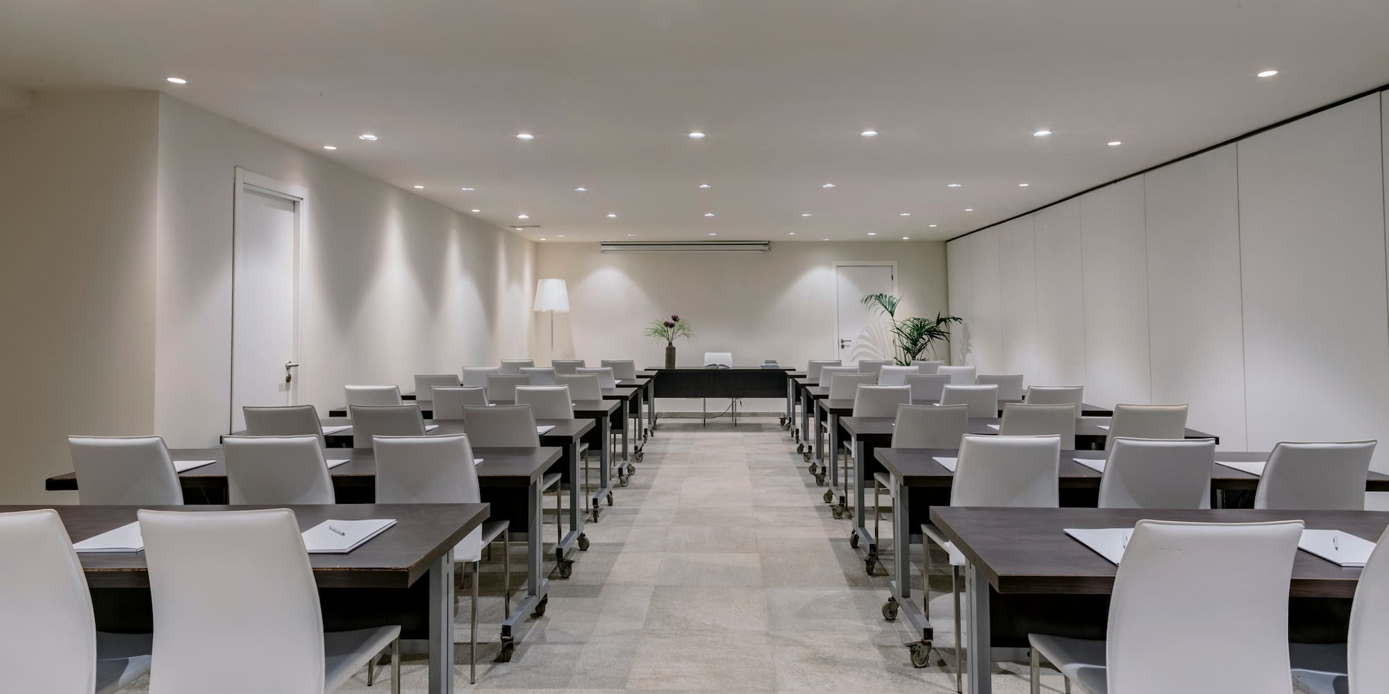 a room with tables and chairs