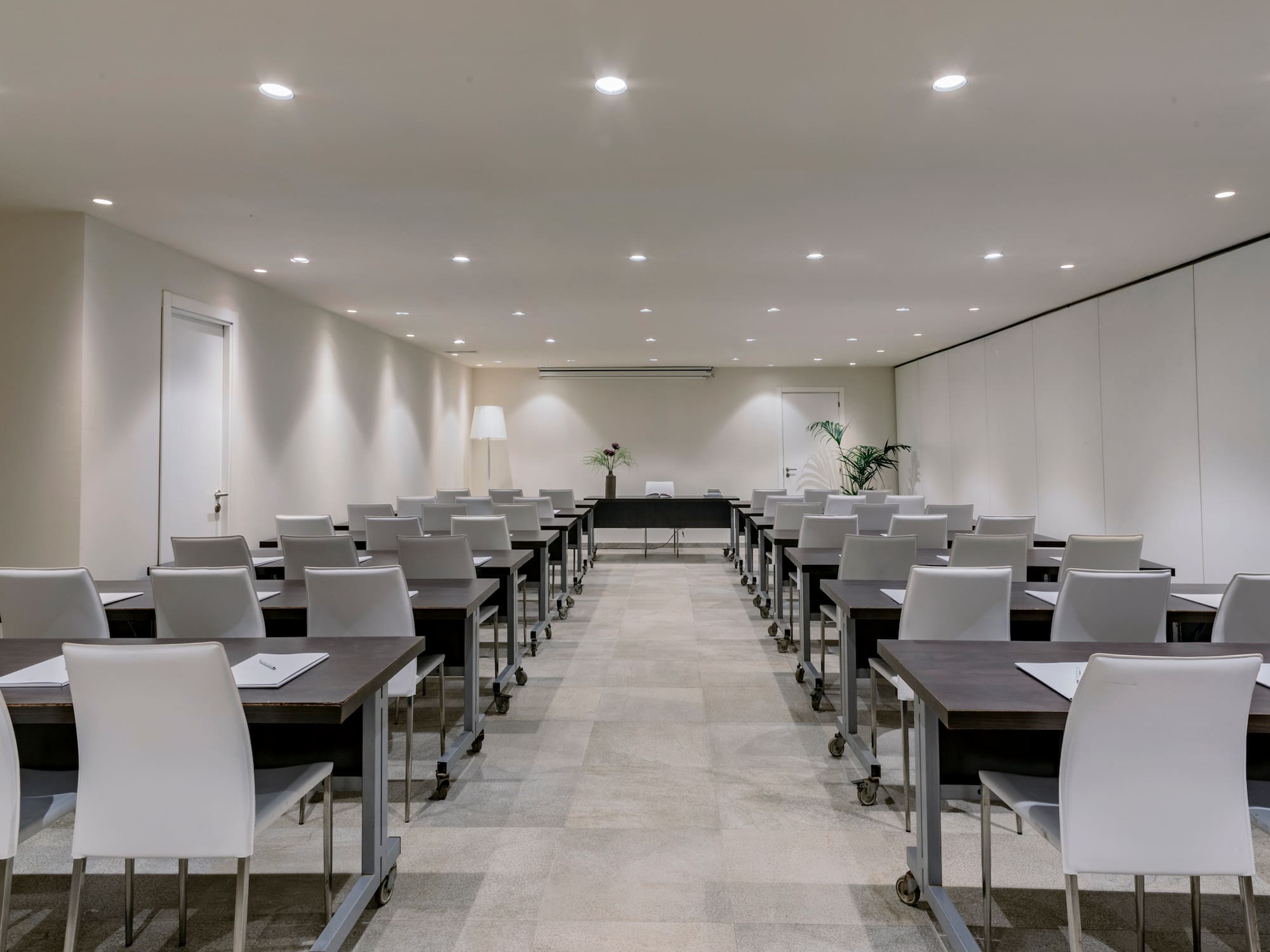 a room with tables and chairs