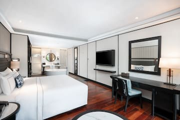 a room with a bed and a desk