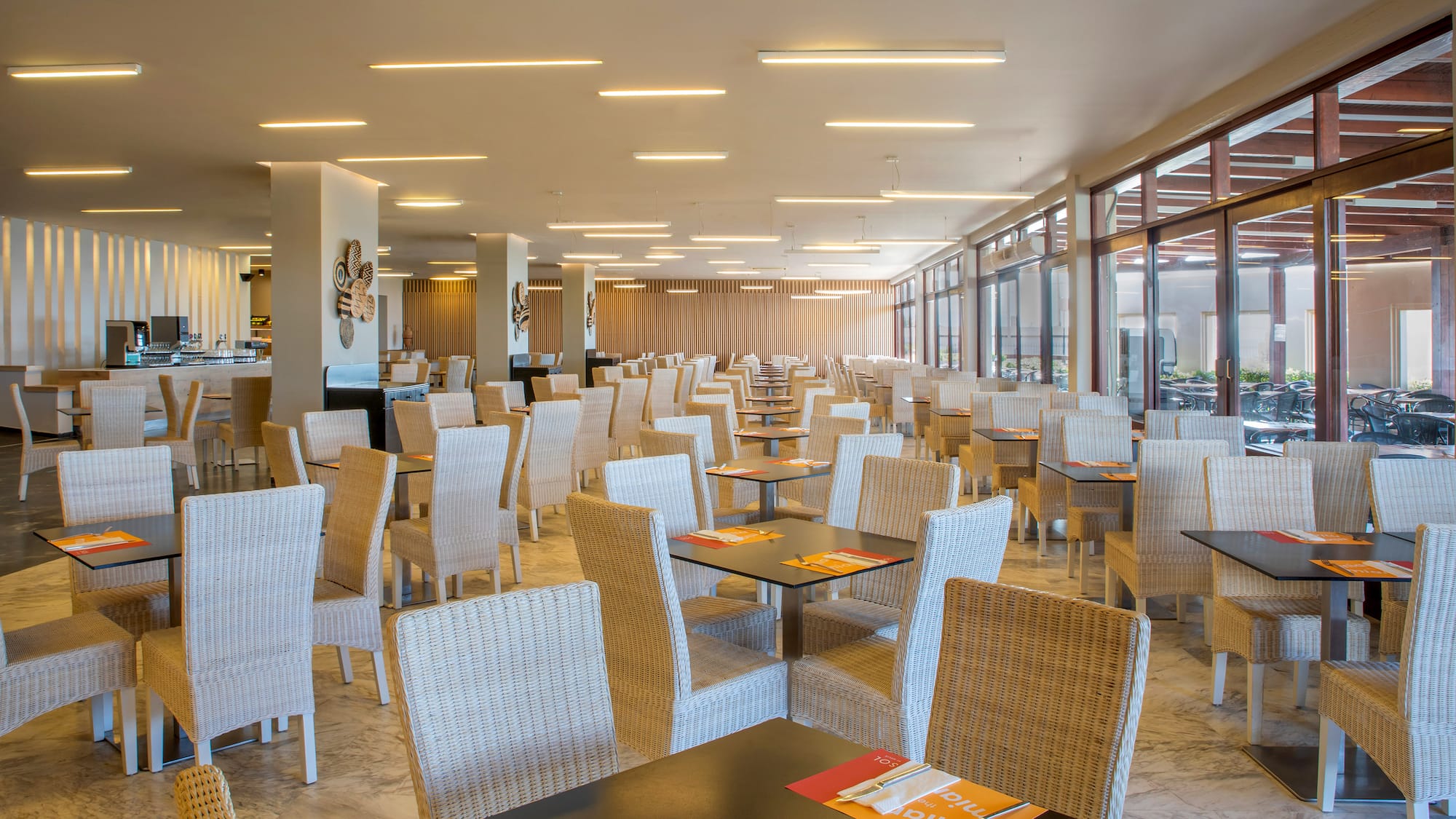 a room with tables and chairs