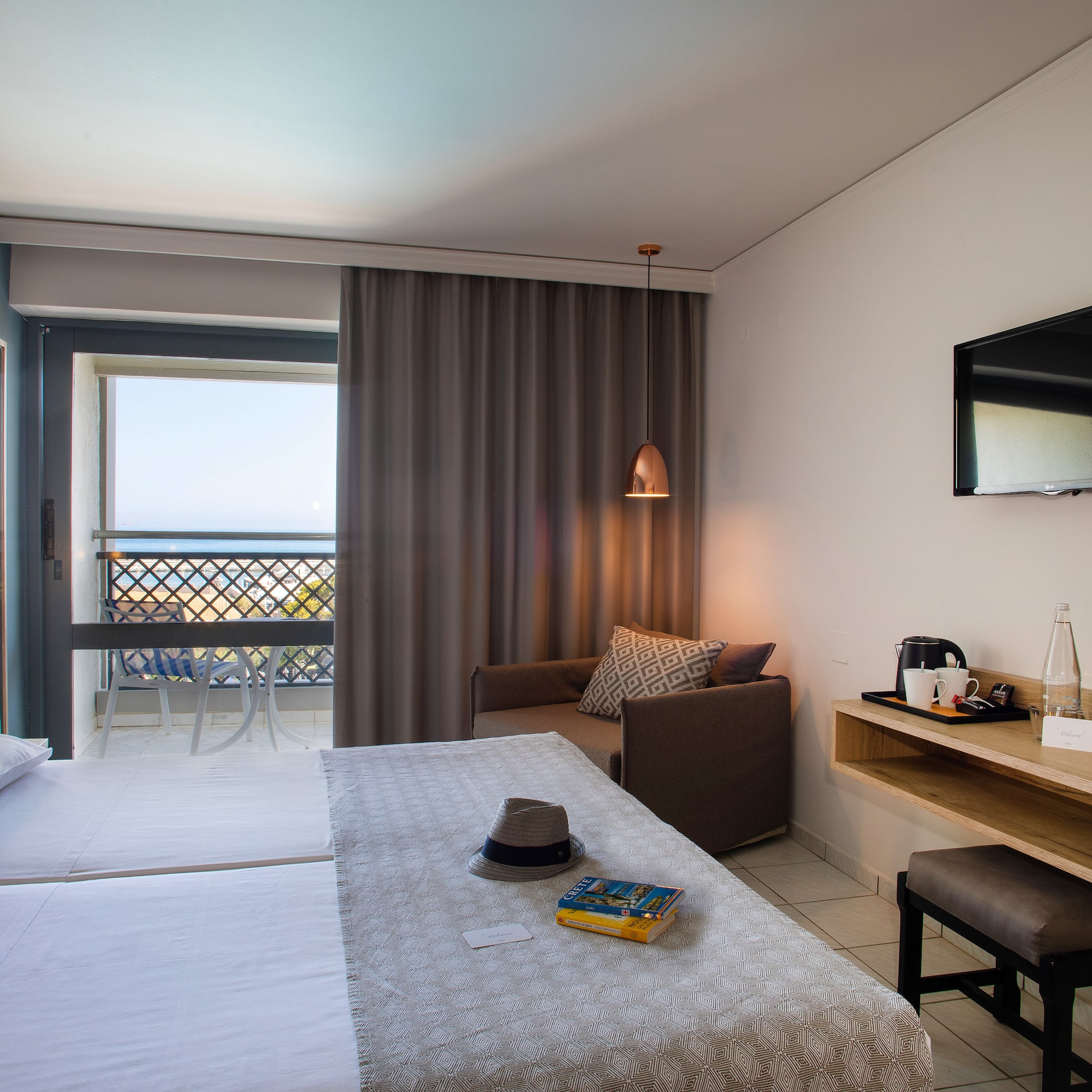 a room with a bed and a television