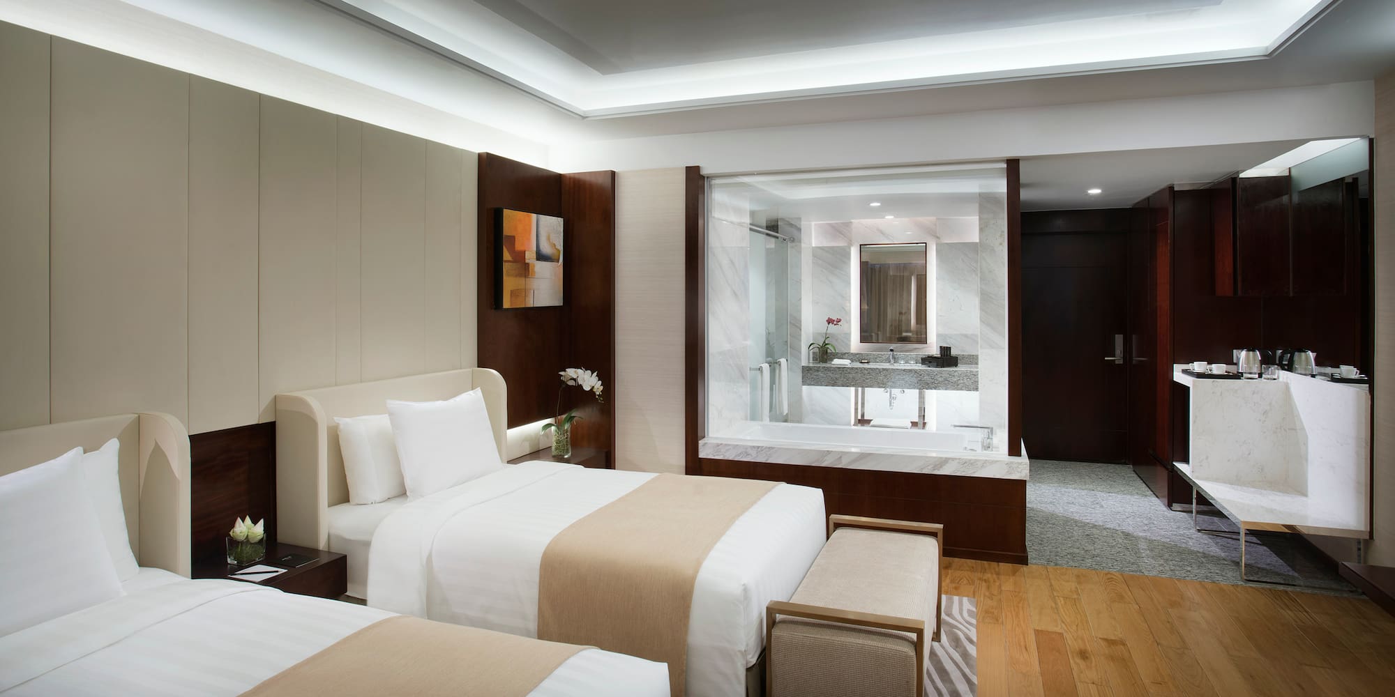 a hotel room with two beds