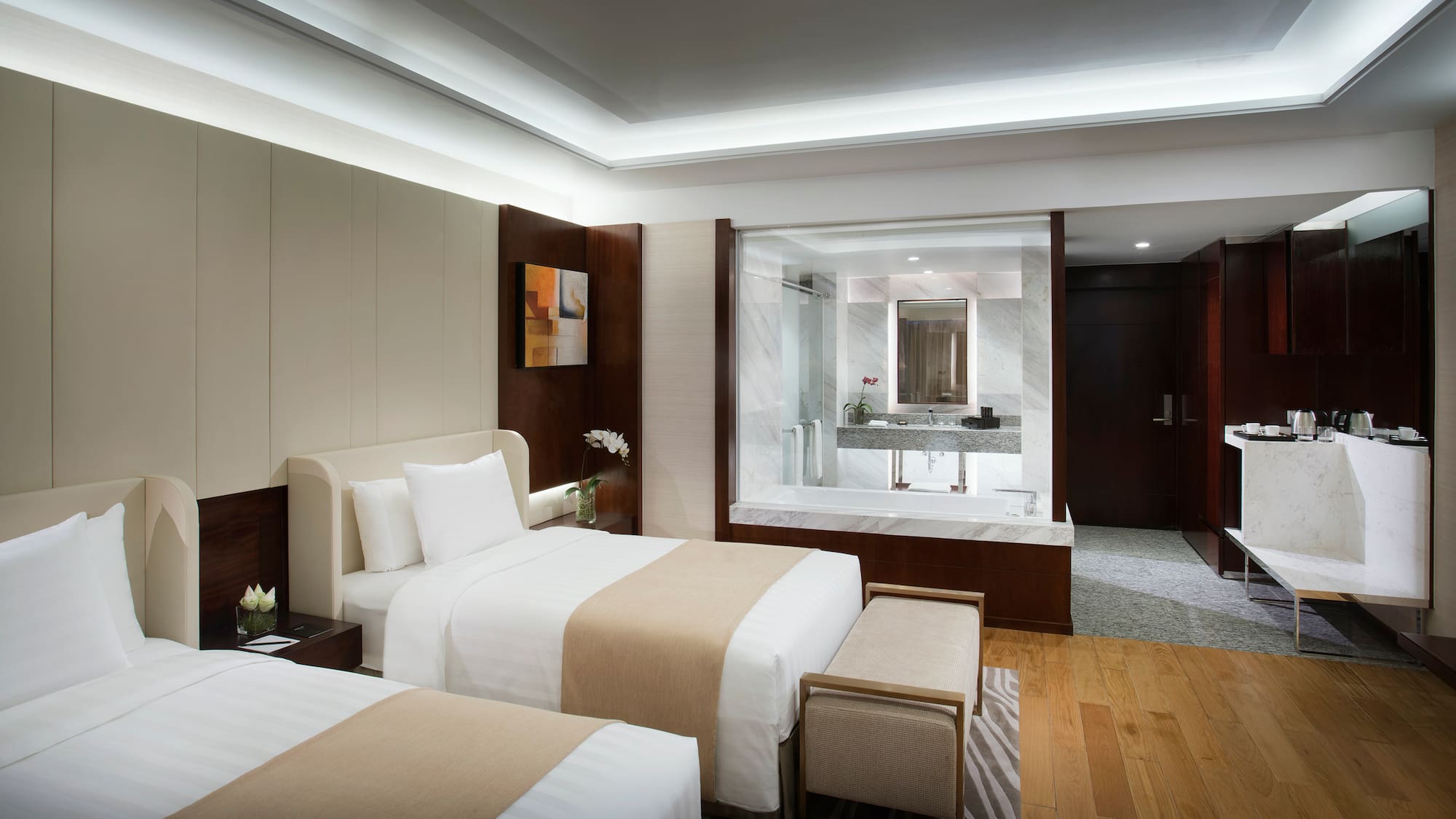 a hotel room with two beds