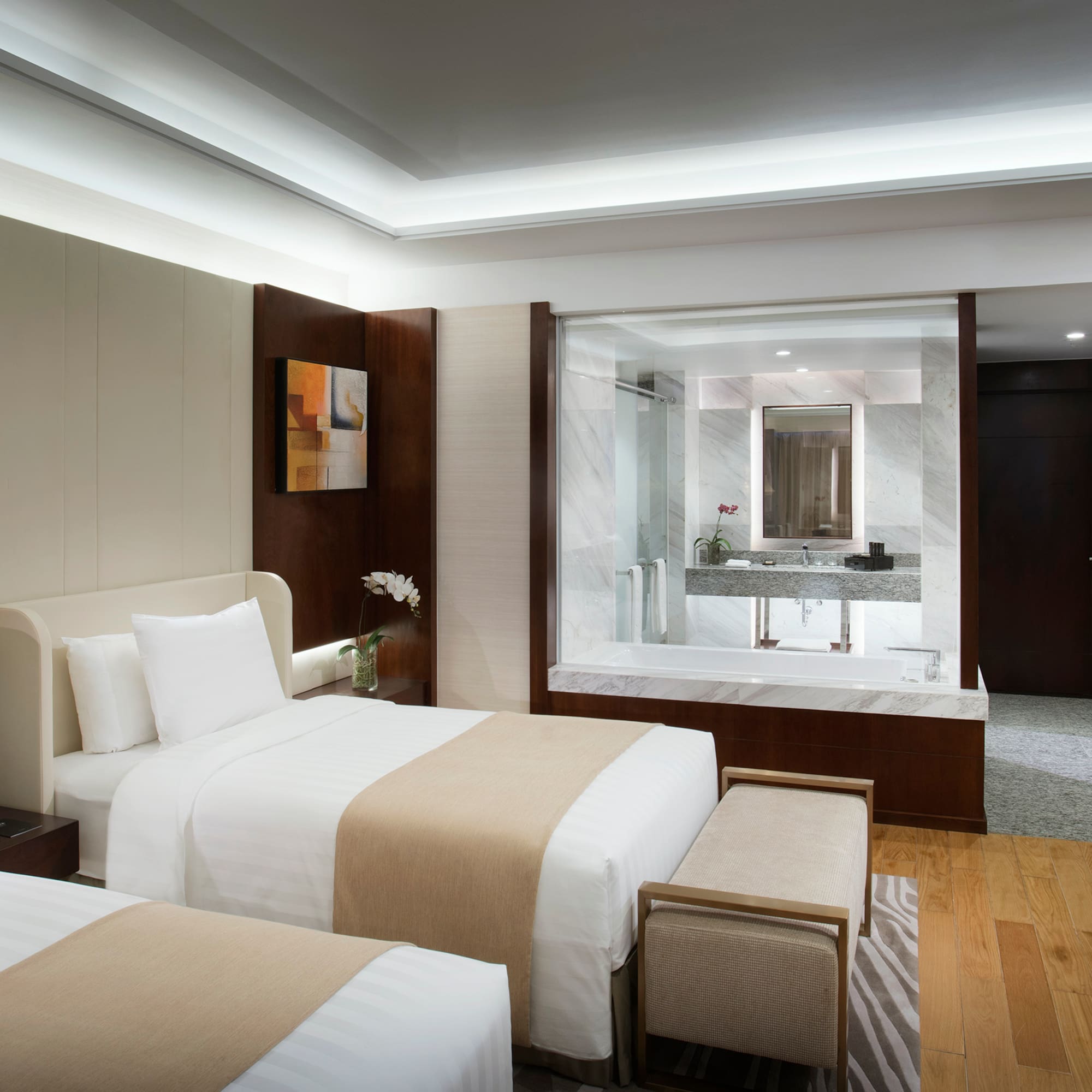 a hotel room with two beds