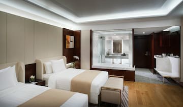 a hotel room with two beds