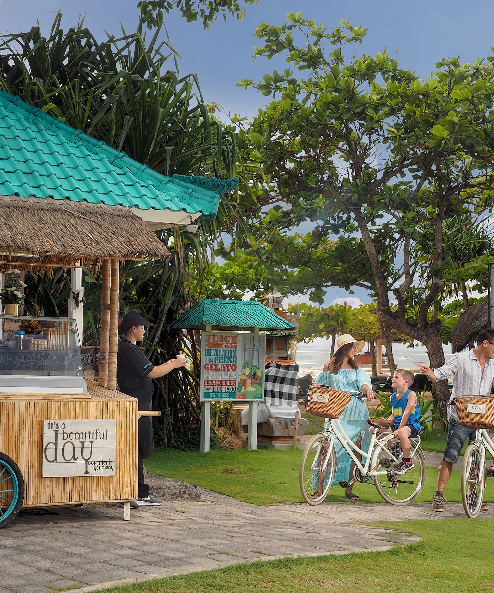 a group of people riding bicycles outside a food truck