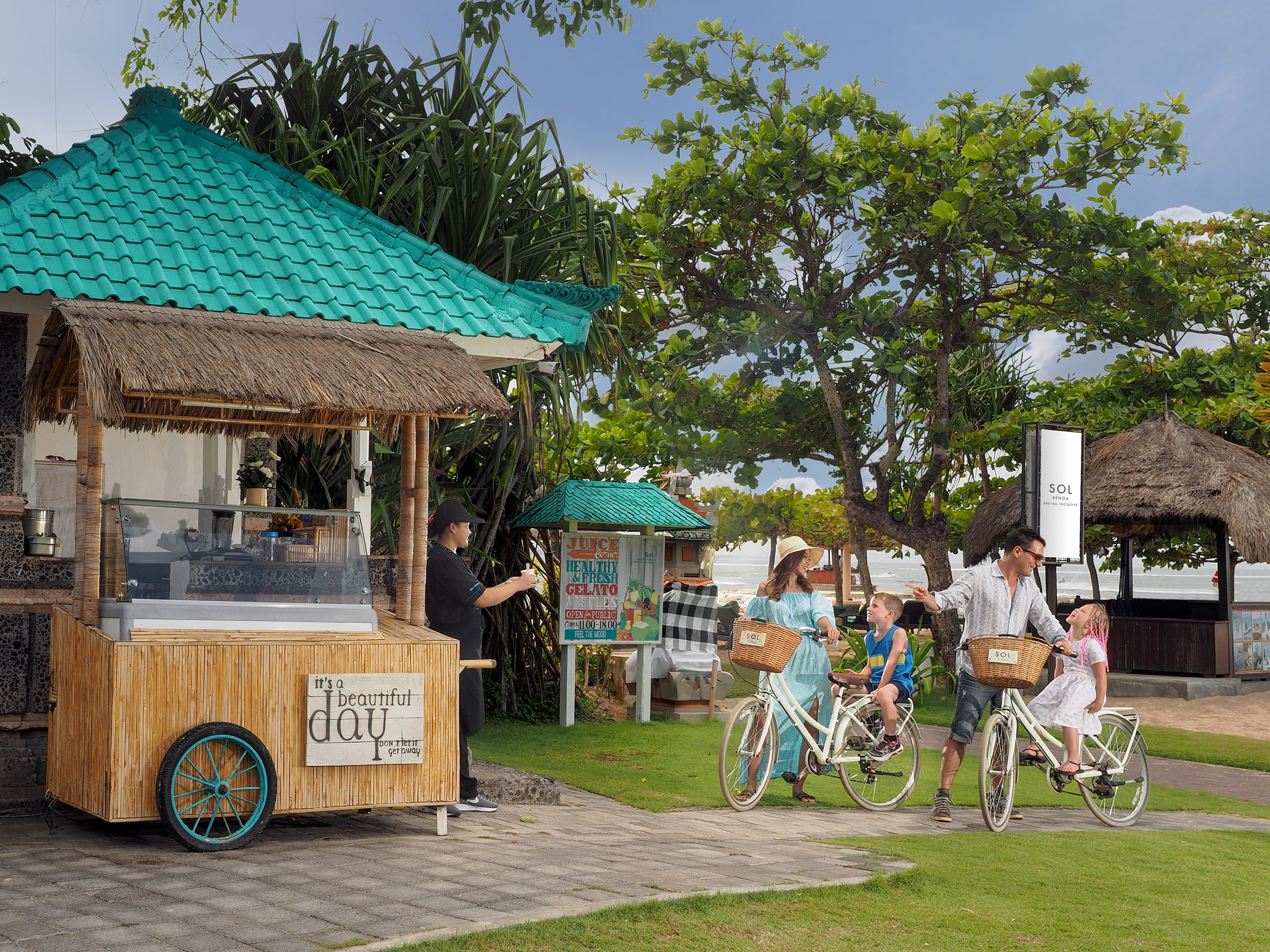 a group of people riding bicycles outside a food truck