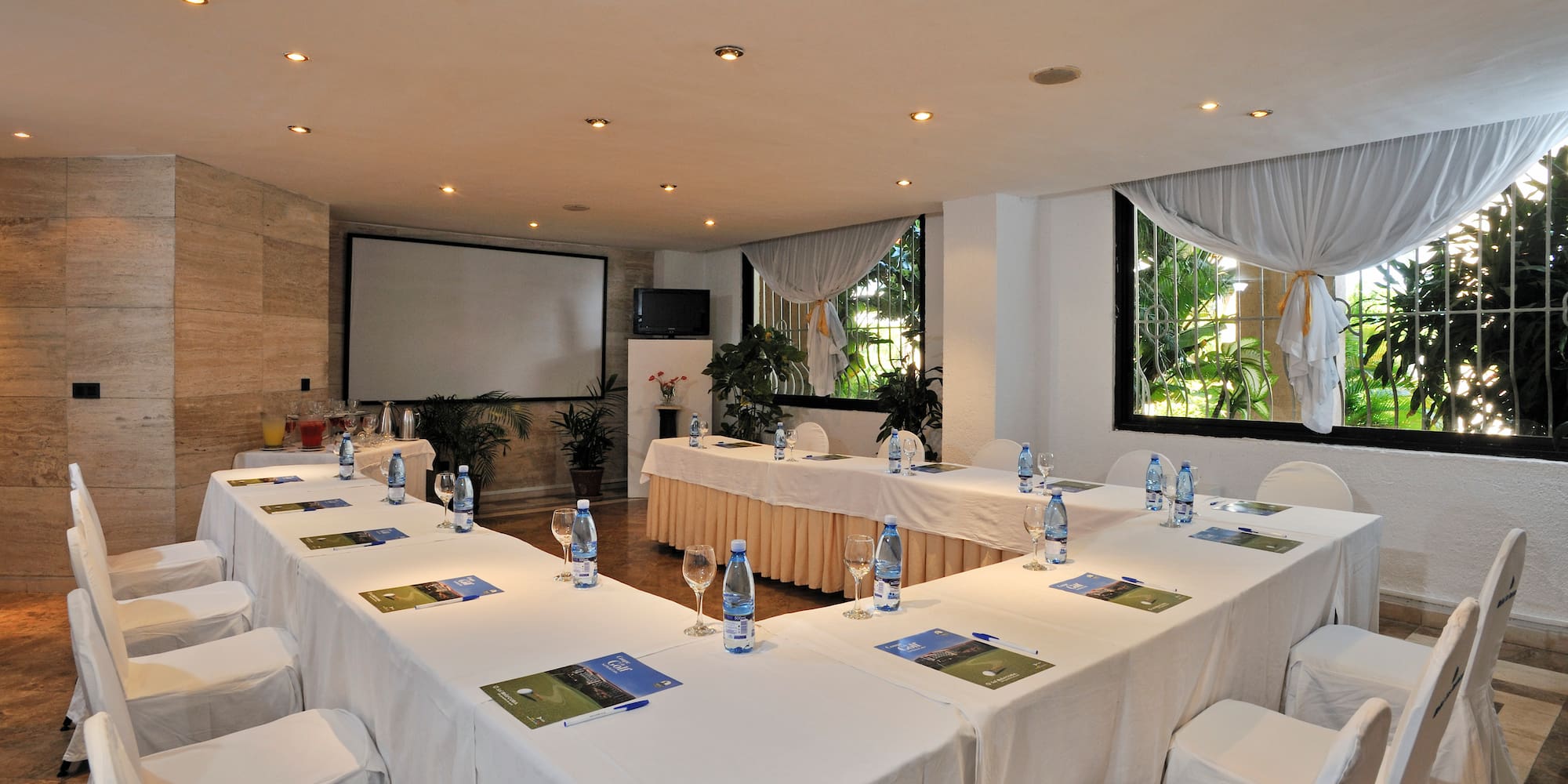 a room with tables and chairs