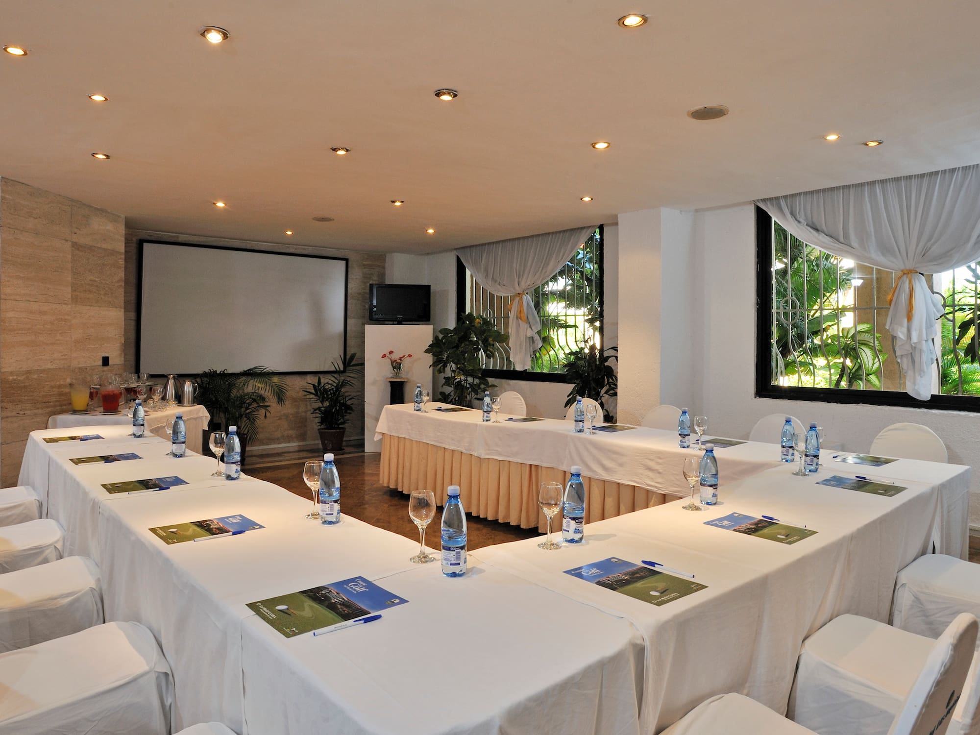 a room with tables and chairs