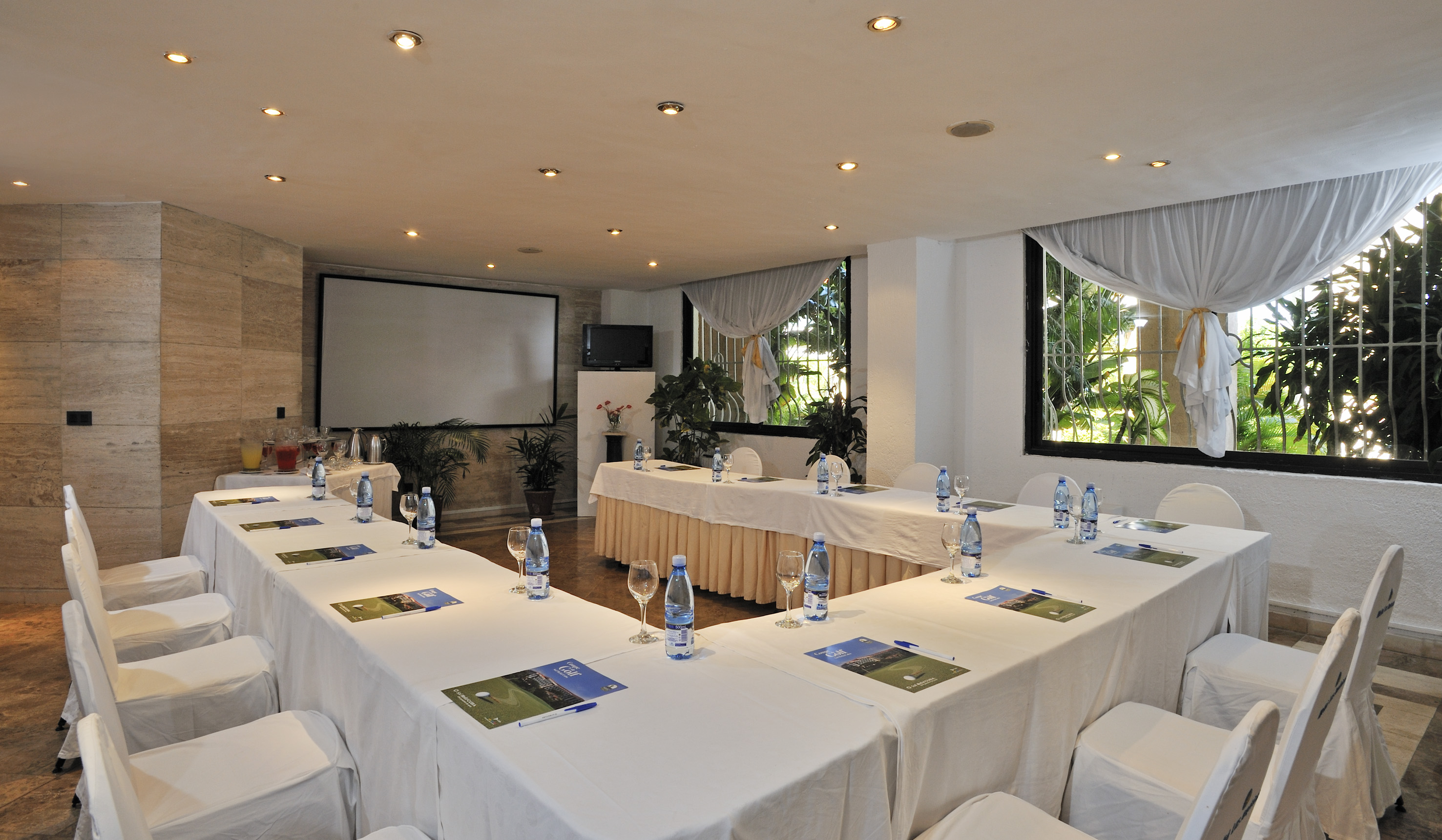 a room with tables and chairs