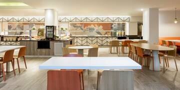 a room with tables and chairs