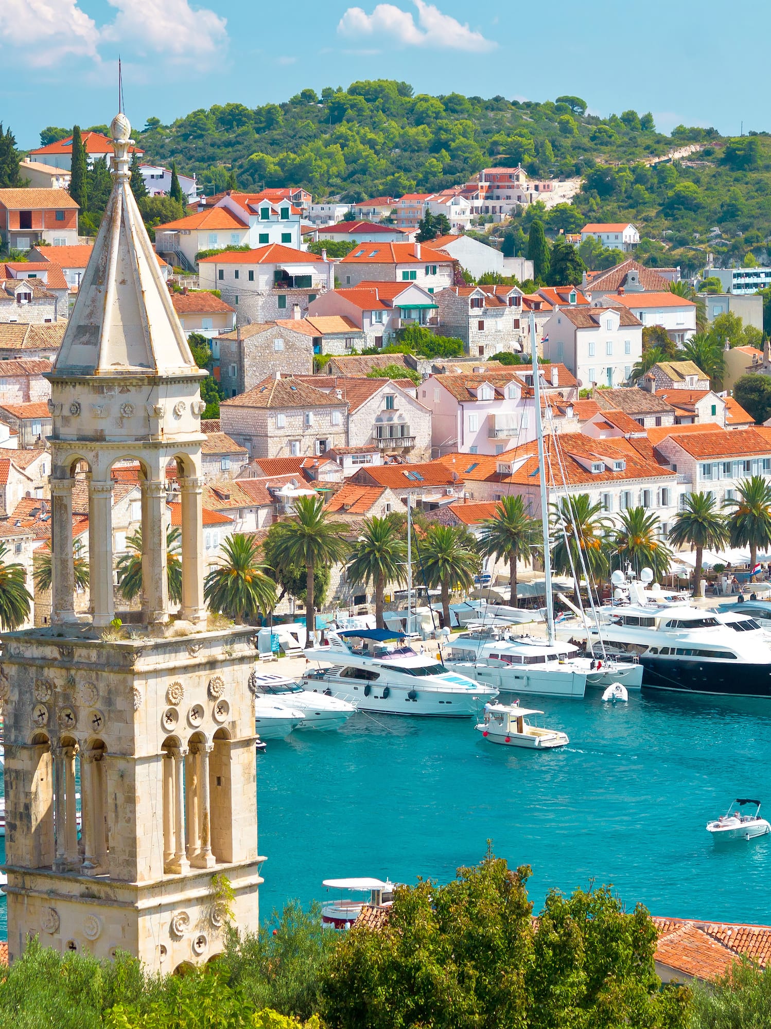 a city with a body of water and boats