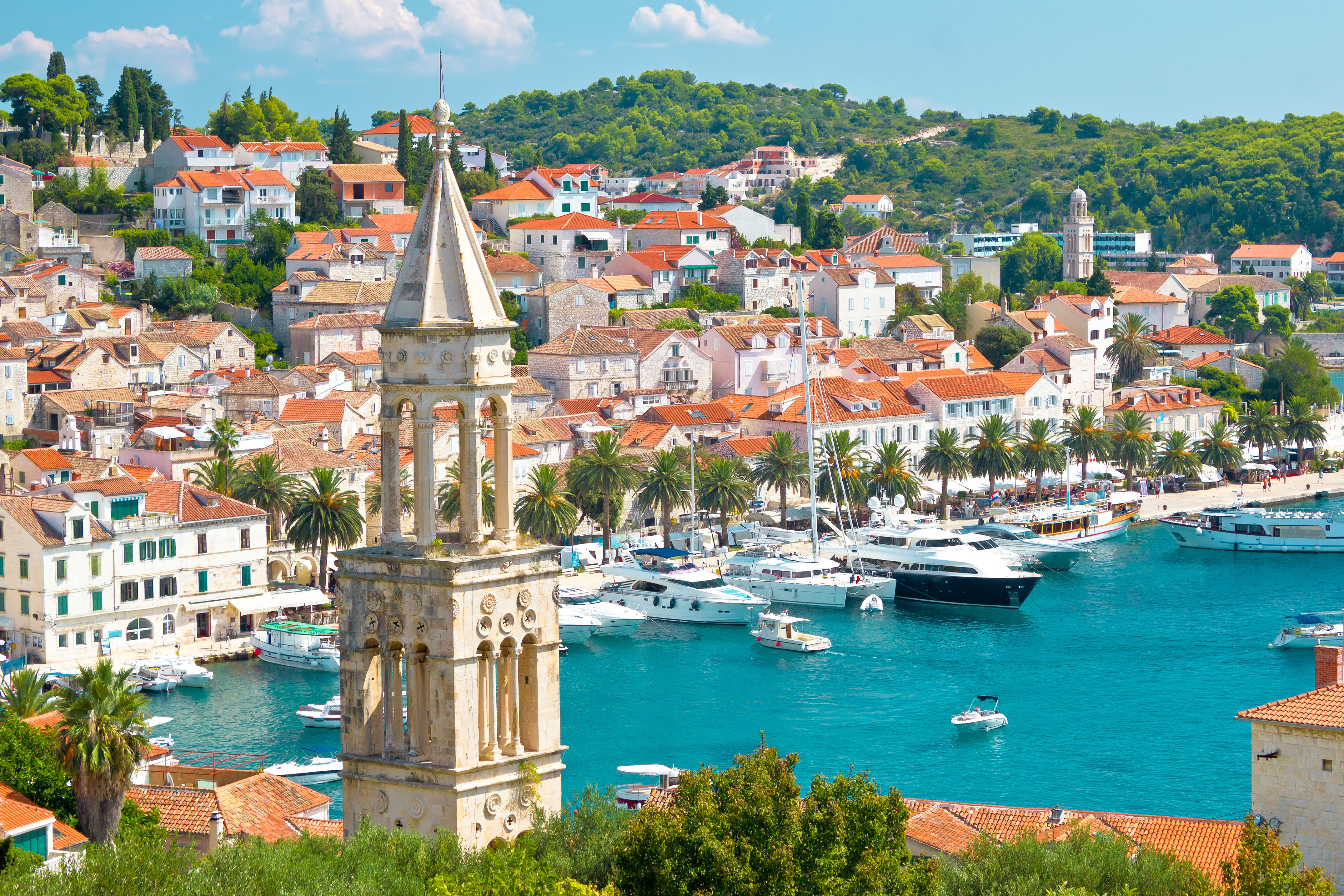 a city with a body of water and boats