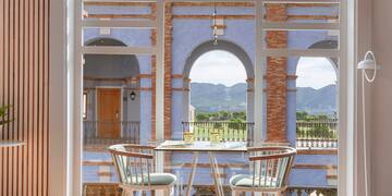 a room with a table and chairs