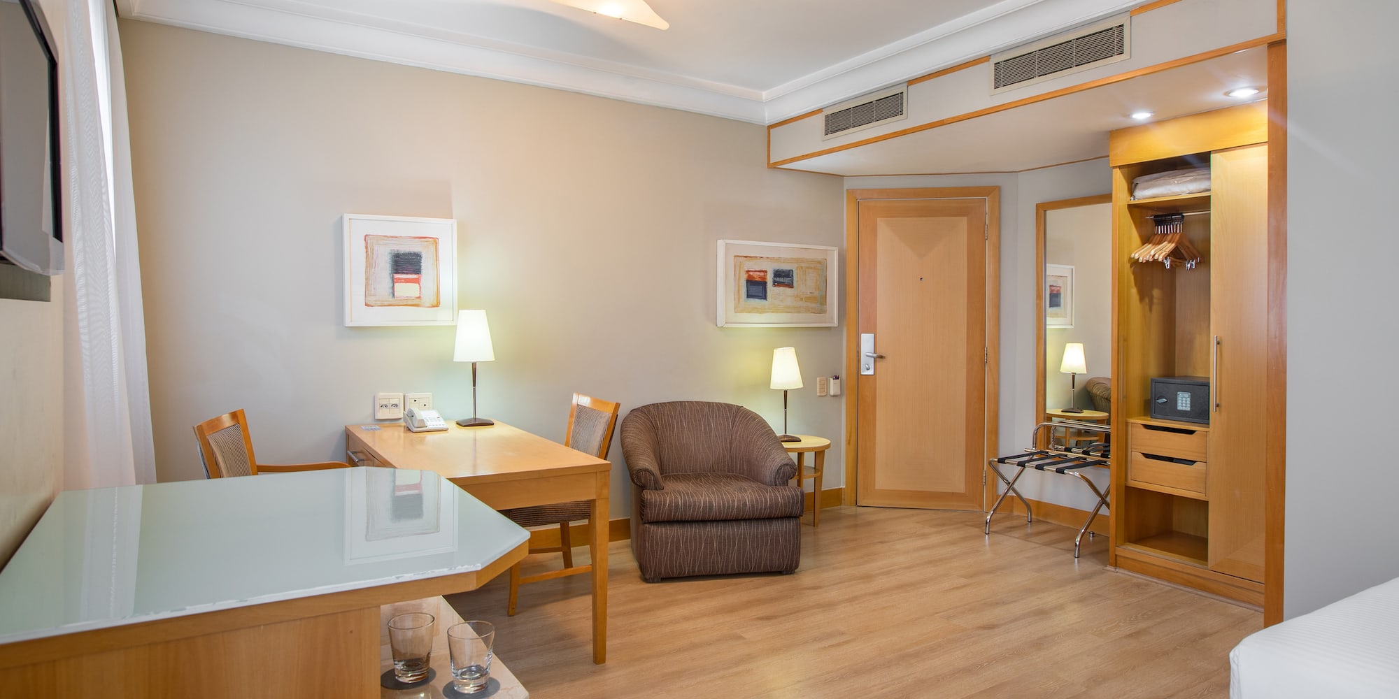 a room with a table and chairs