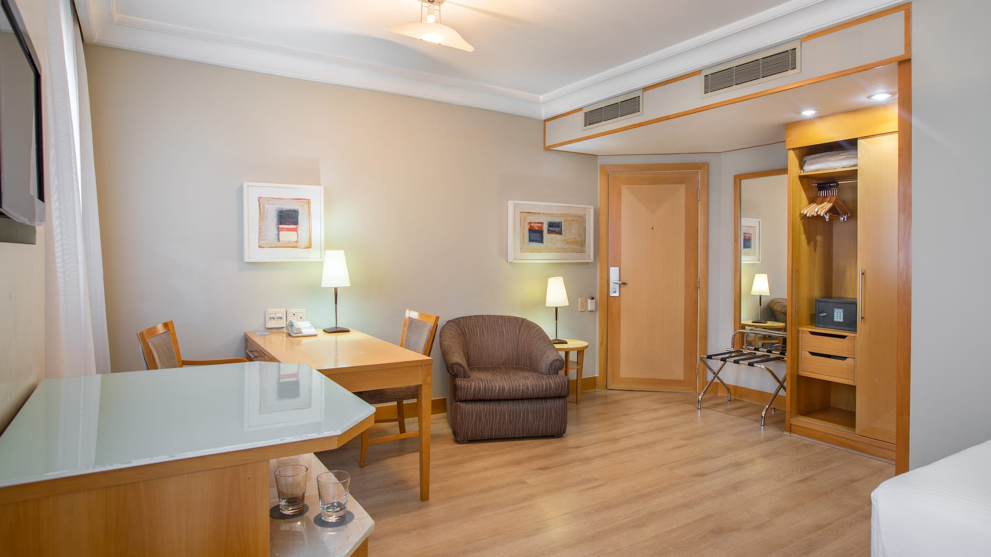 a room with a table and chairs