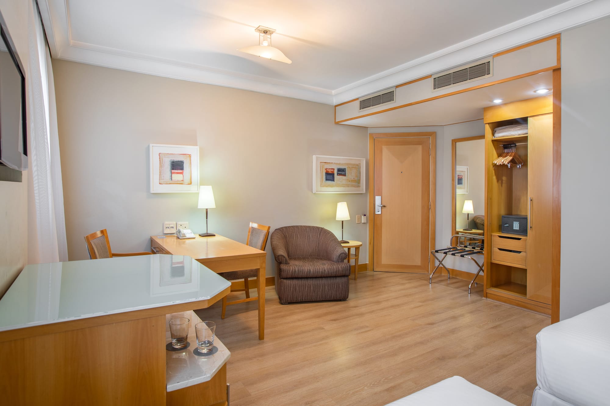 a room with a table and chairs