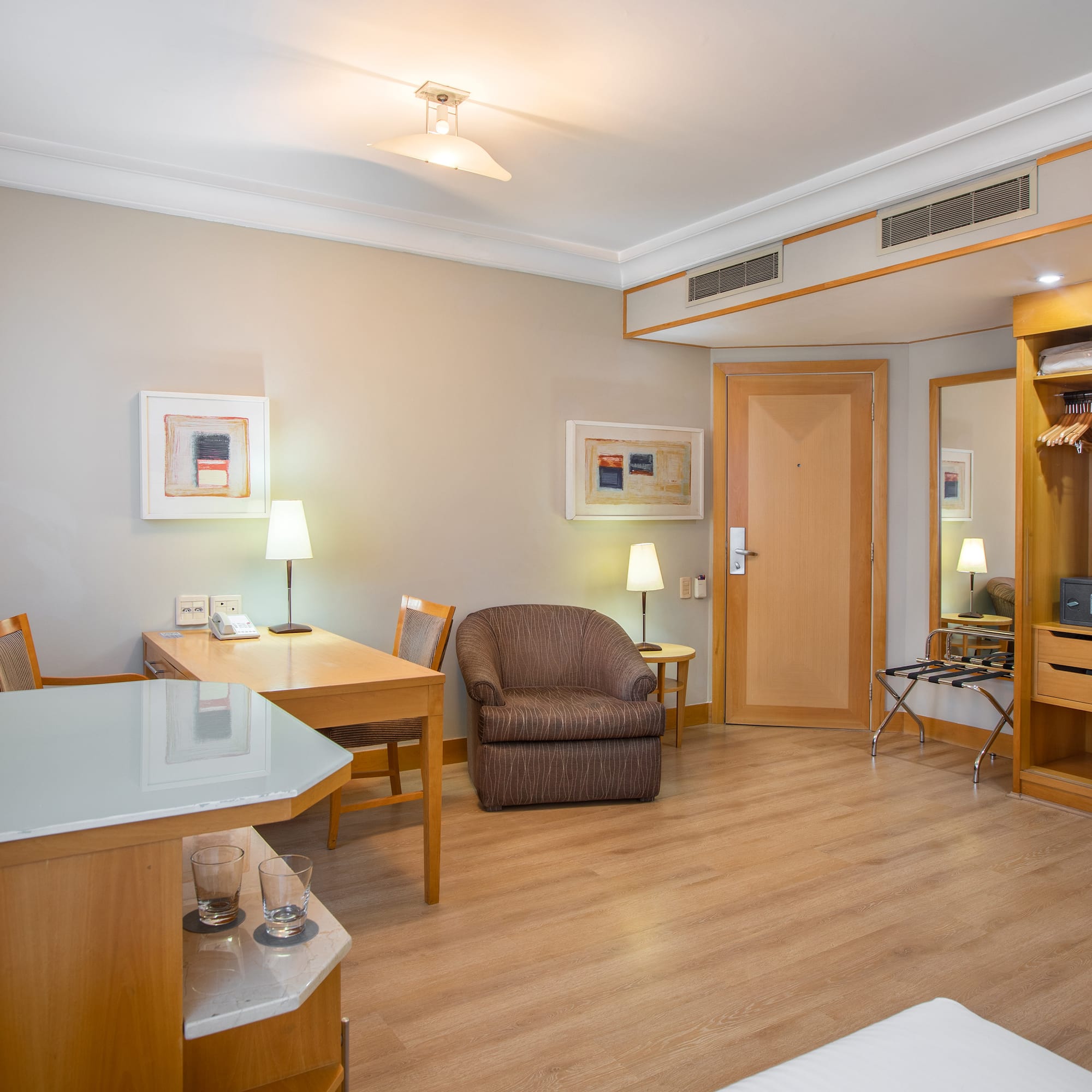 a room with a table and chairs