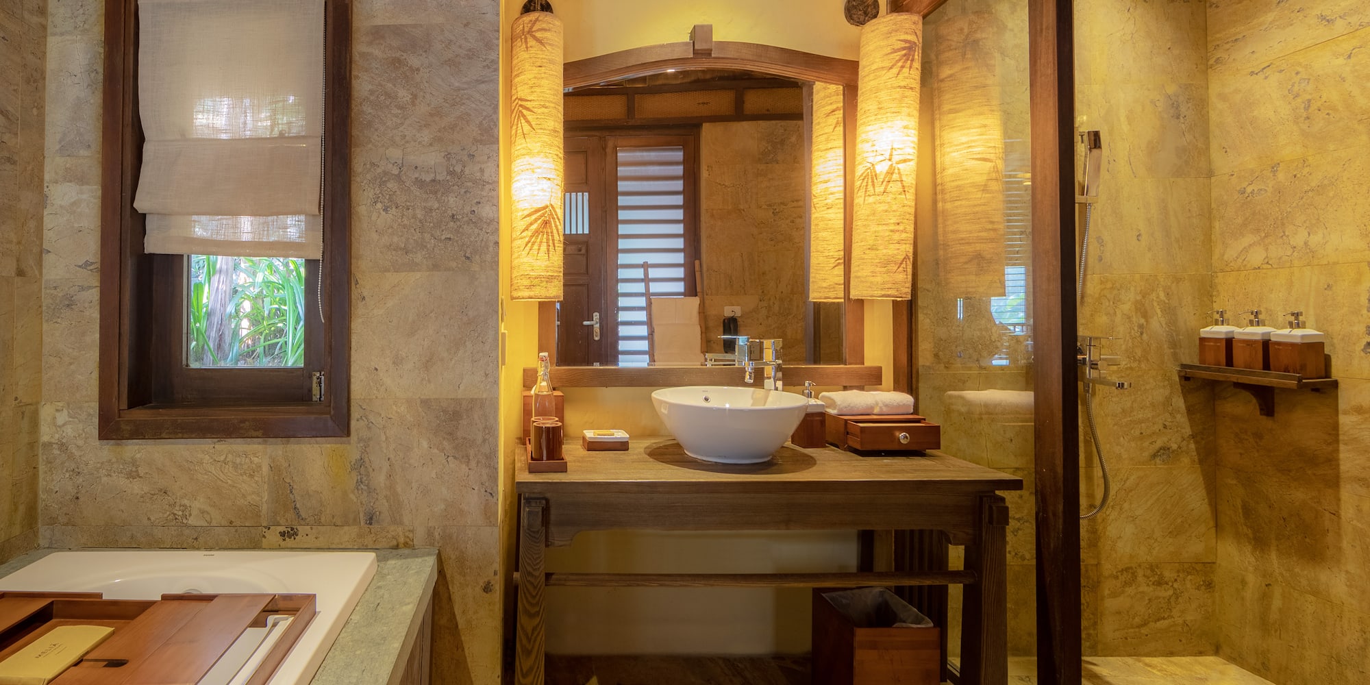 a bathroom with a sink and shower