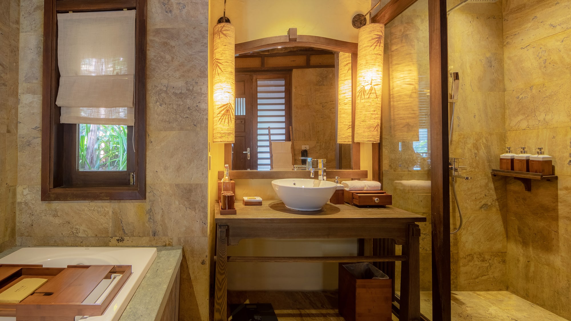 a bathroom with a sink and shower