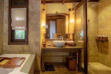 a bathroom with a sink and shower