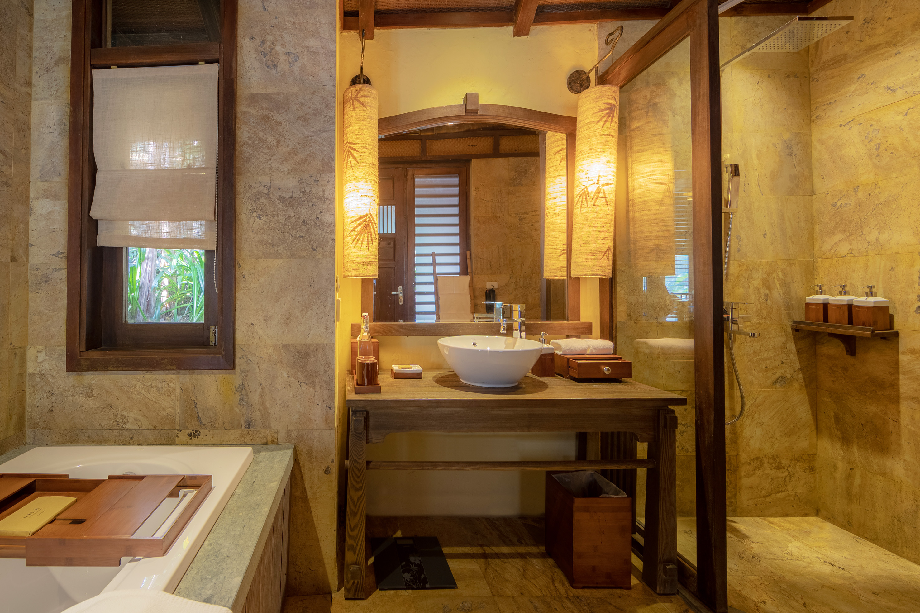 a bathroom with a sink and shower