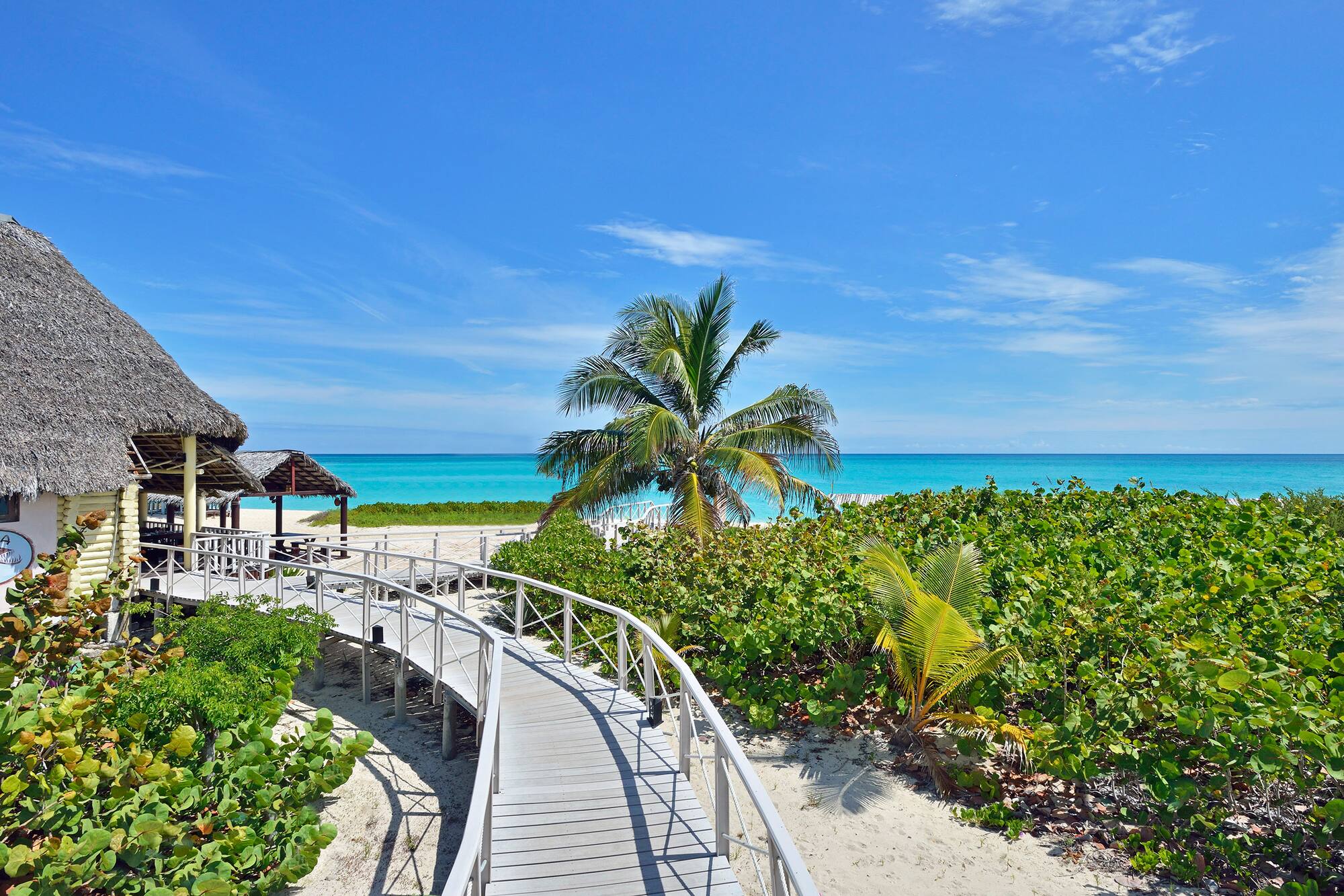 a walkway leading to a beach