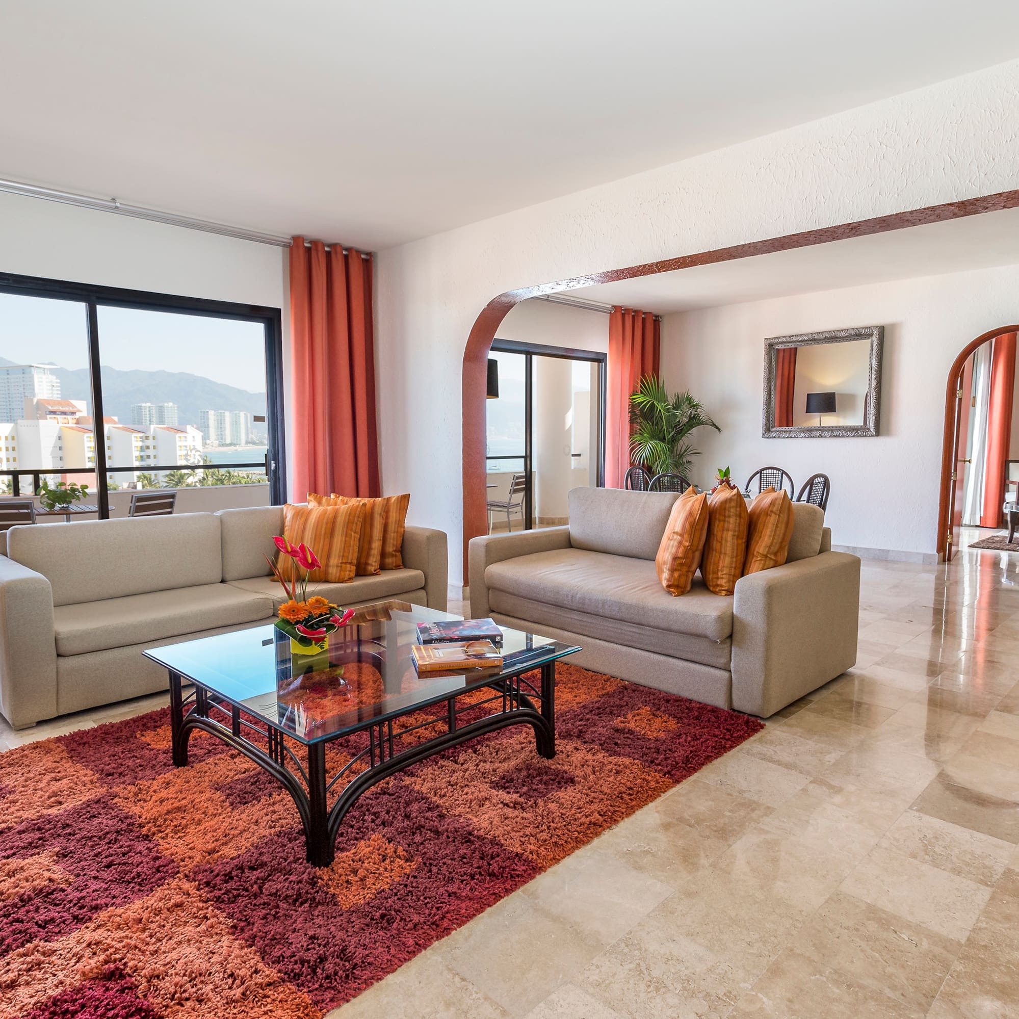 a living room with couches and a coffee table