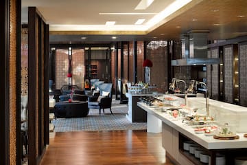 a restaurant with food on the counter