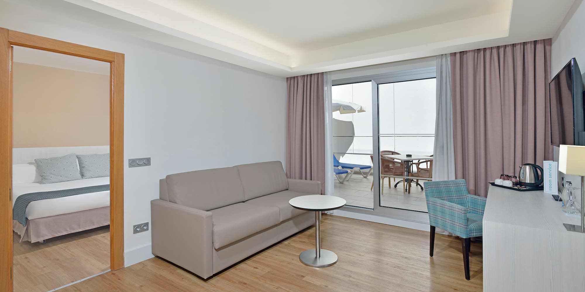 a living room with a couch and a table