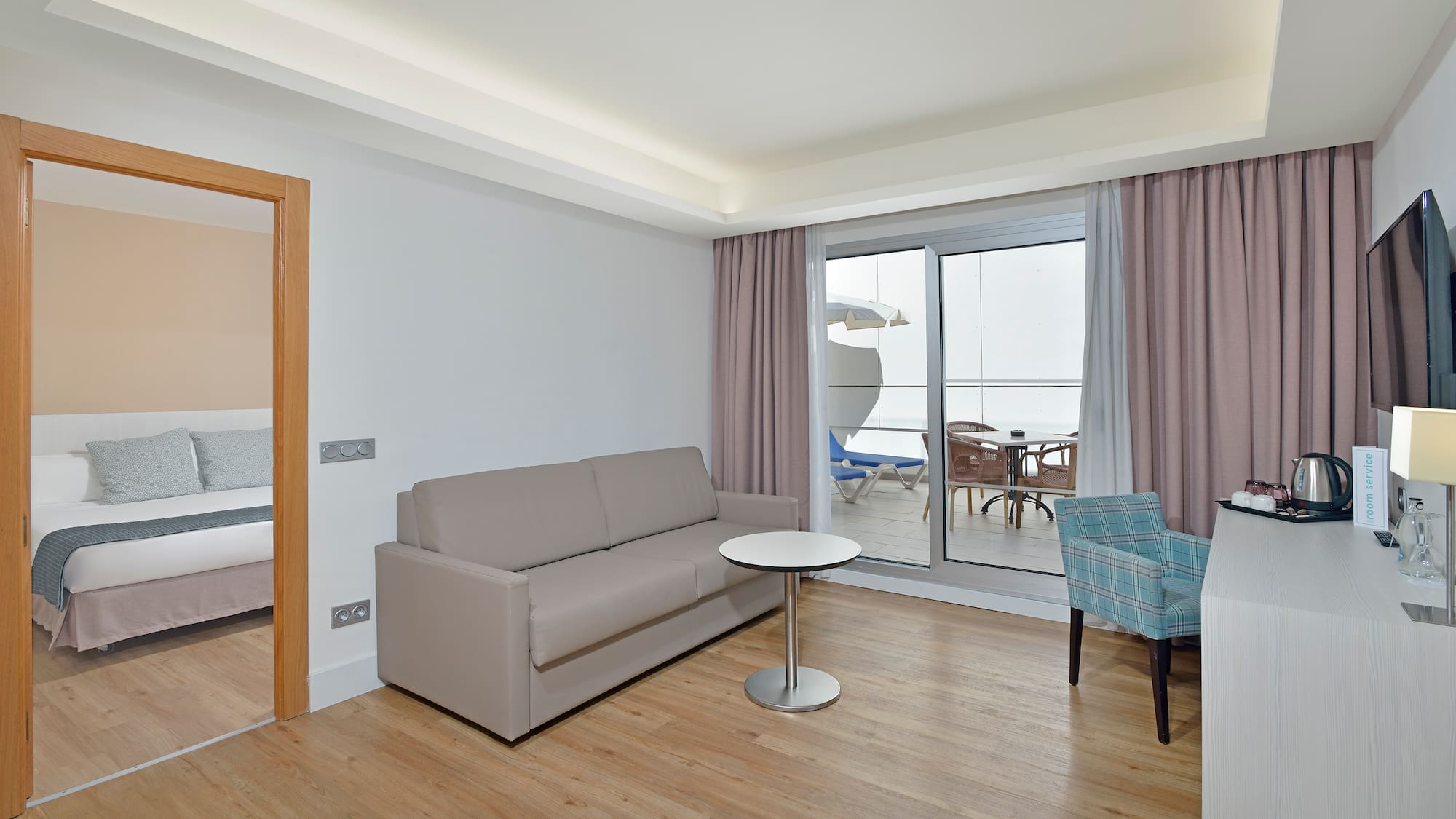 a living room with a couch and a table