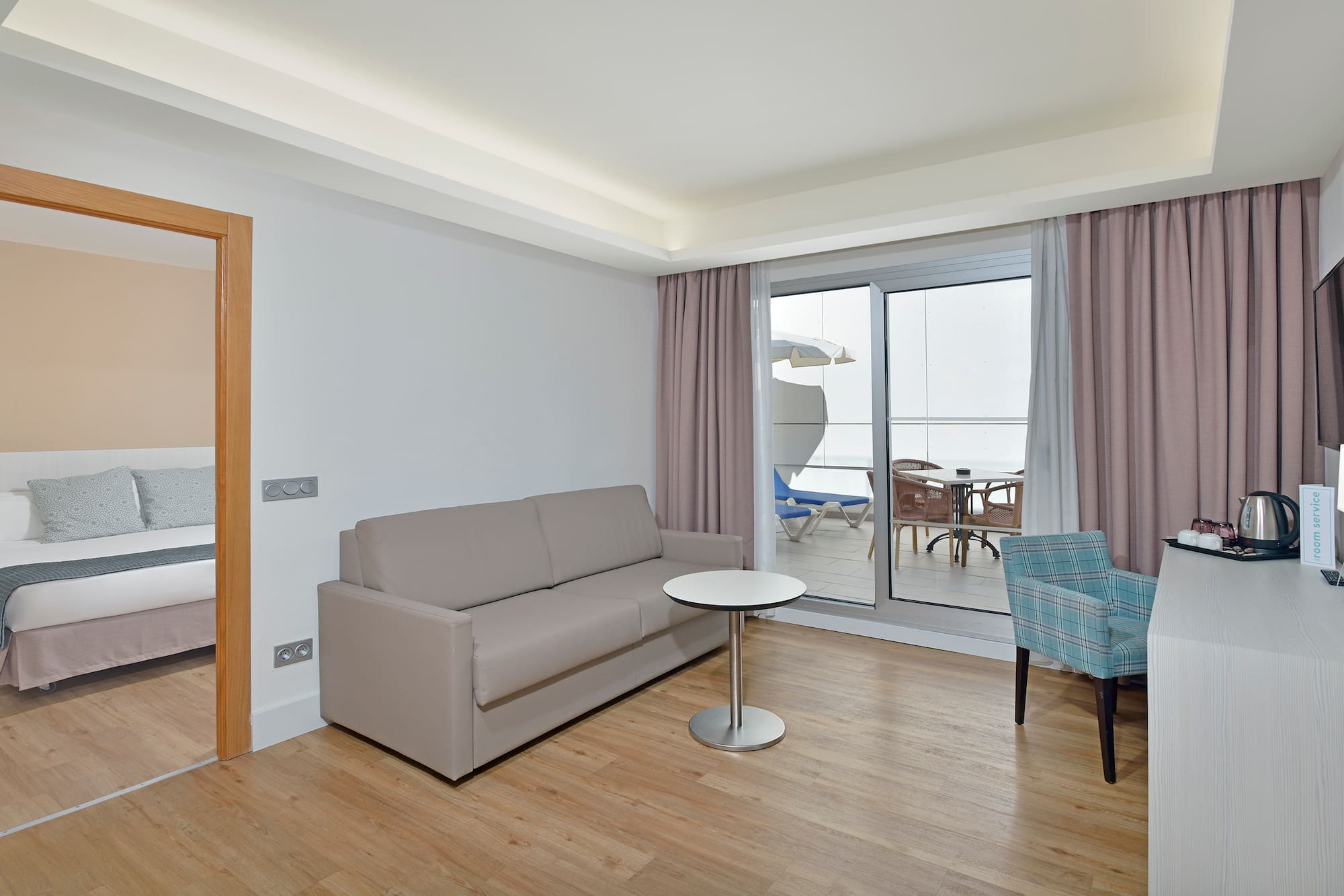 a living room with a couch and a table