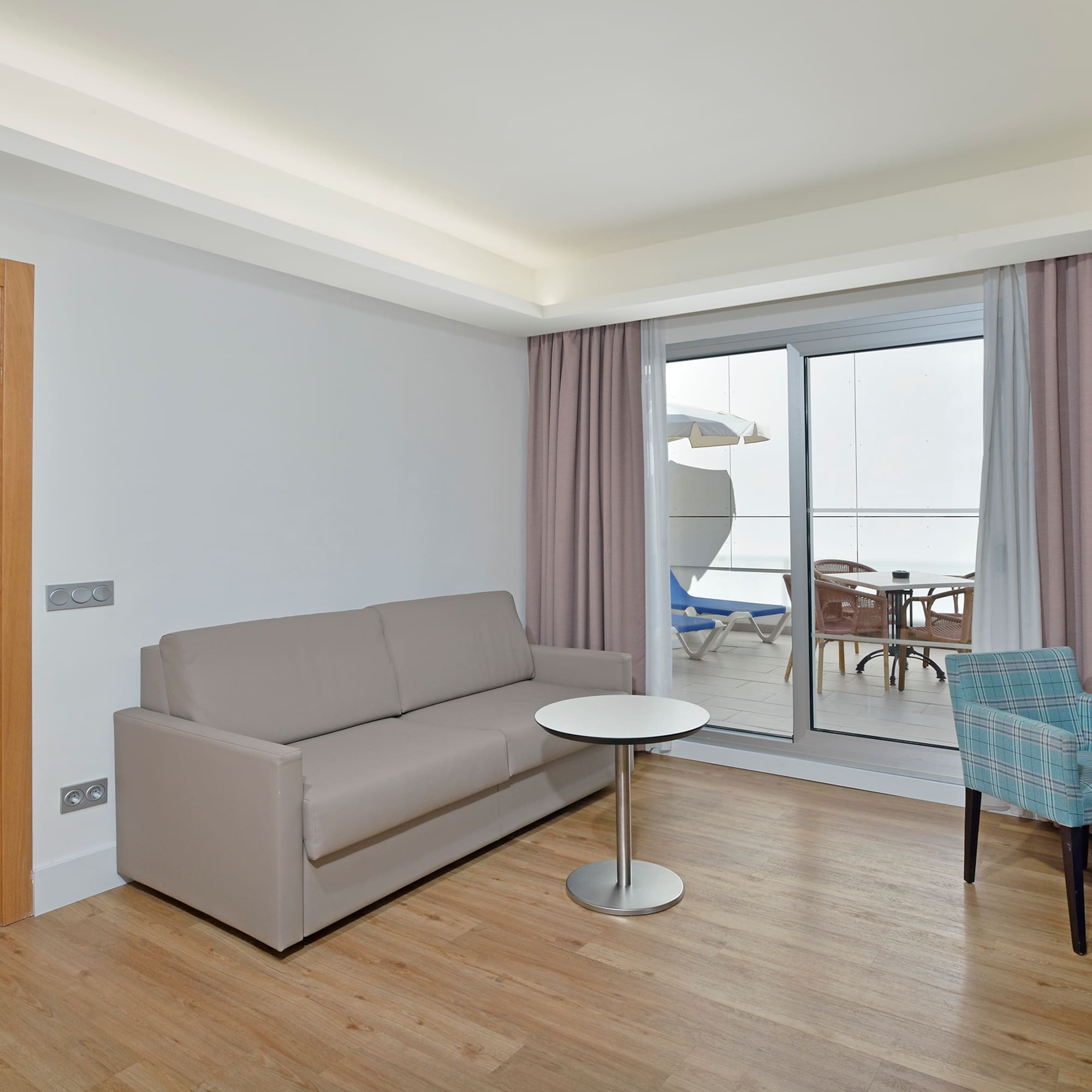 a living room with a couch and a table